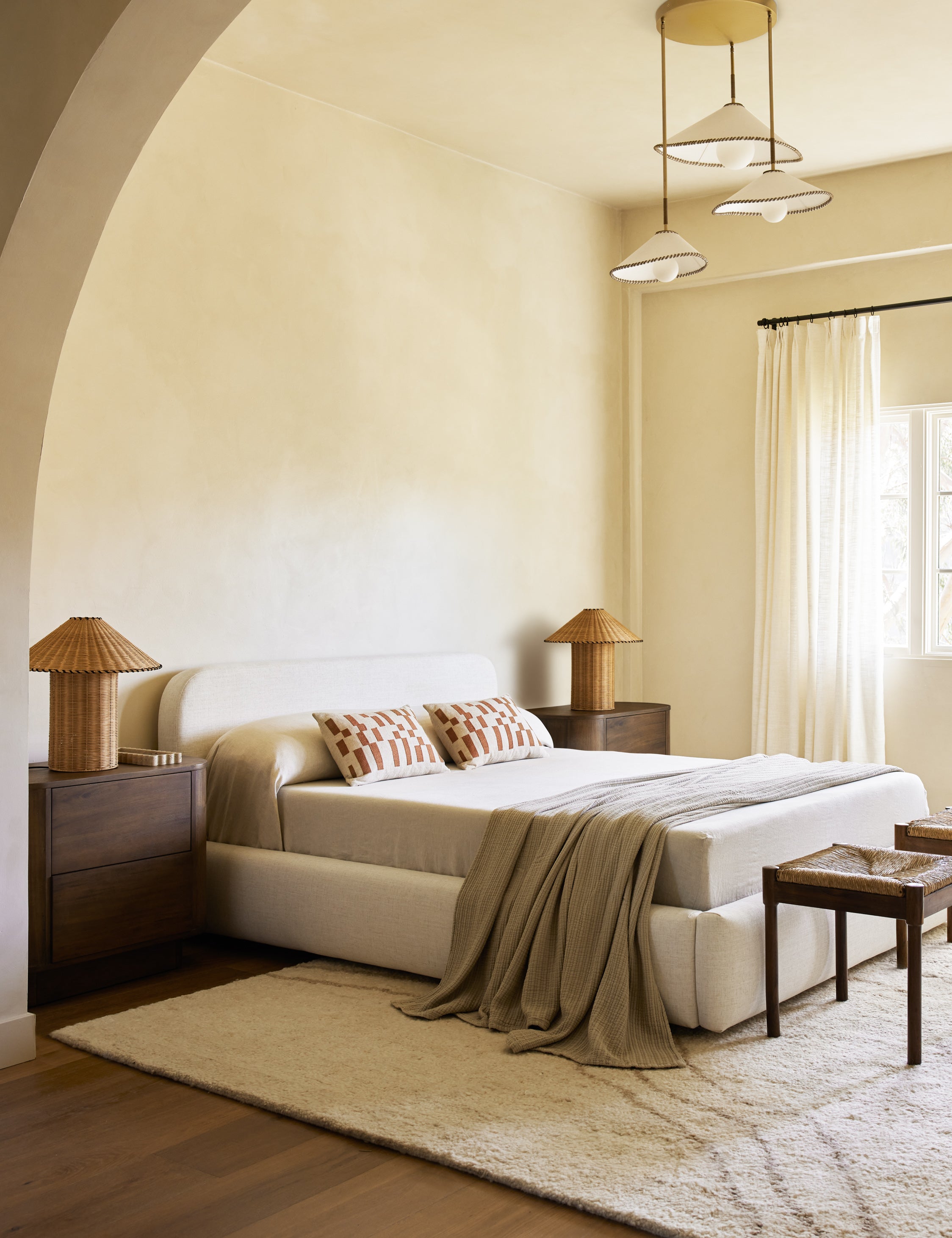 Mosaic Linen Lumbar Pillow by Elan Byrd styled in a bedroom.