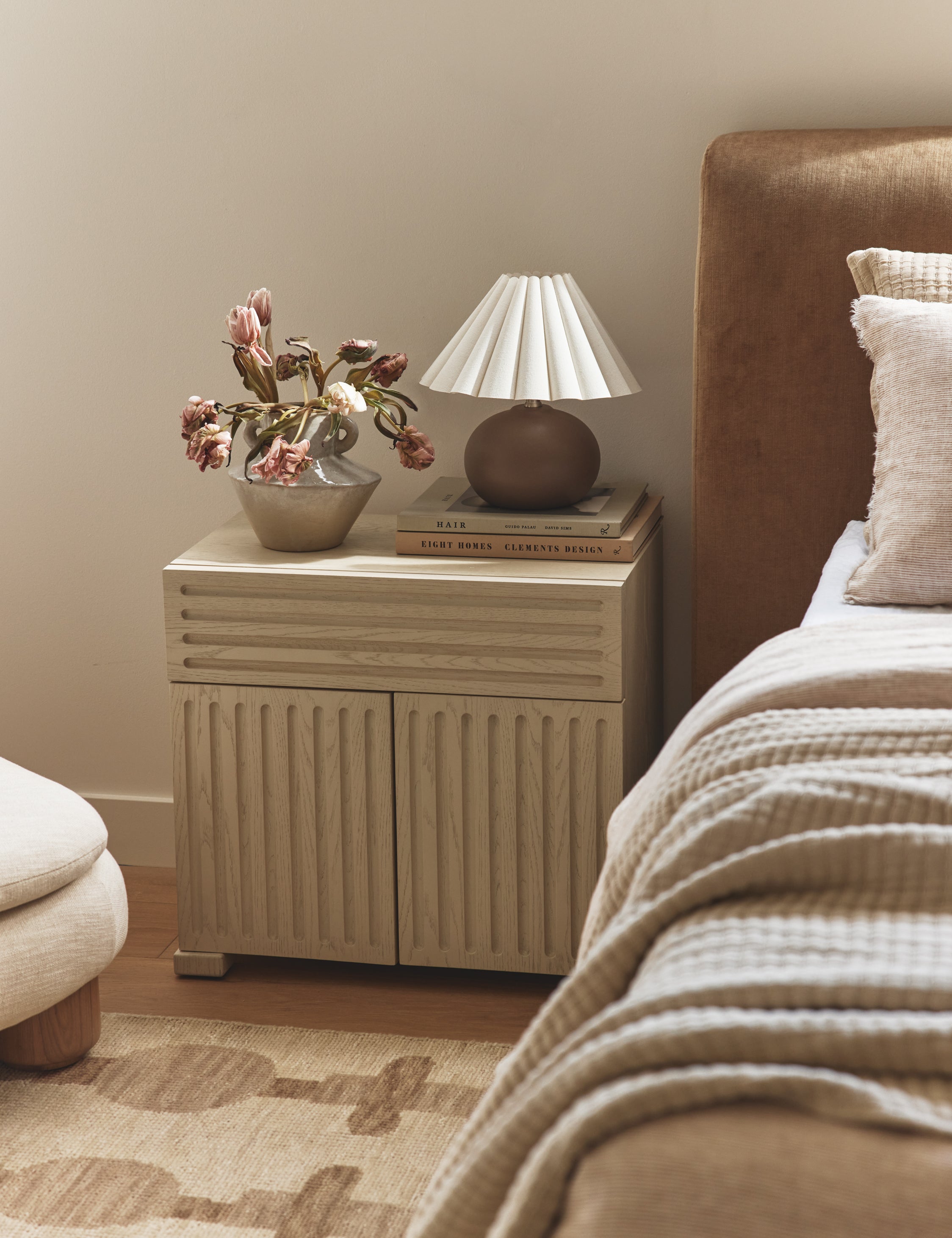 Bedroom featuring the Beck grooved light wood nightstand.