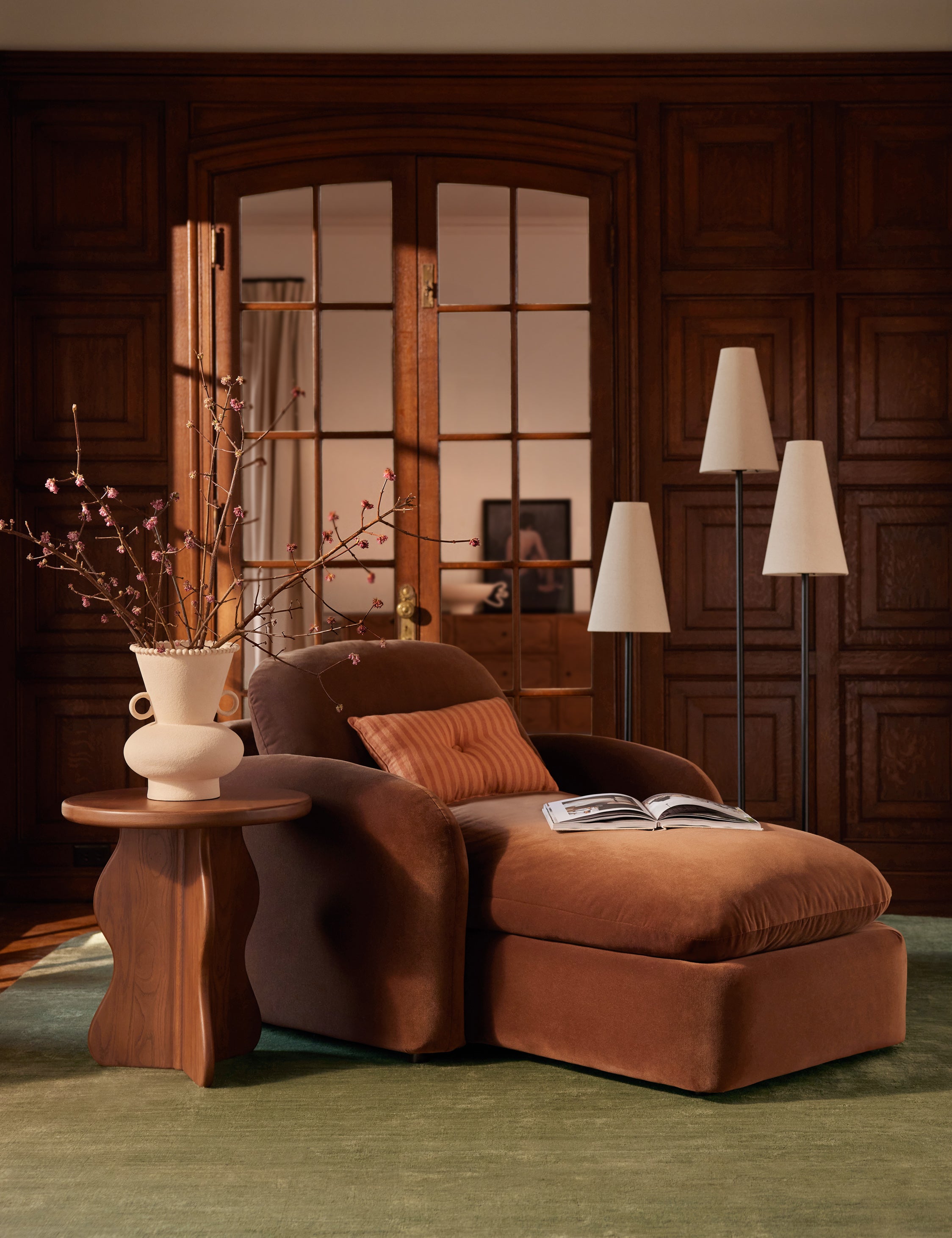 Welby striped tufted button linen throw pillow by Aimee Song styled on a chaise lounge chair