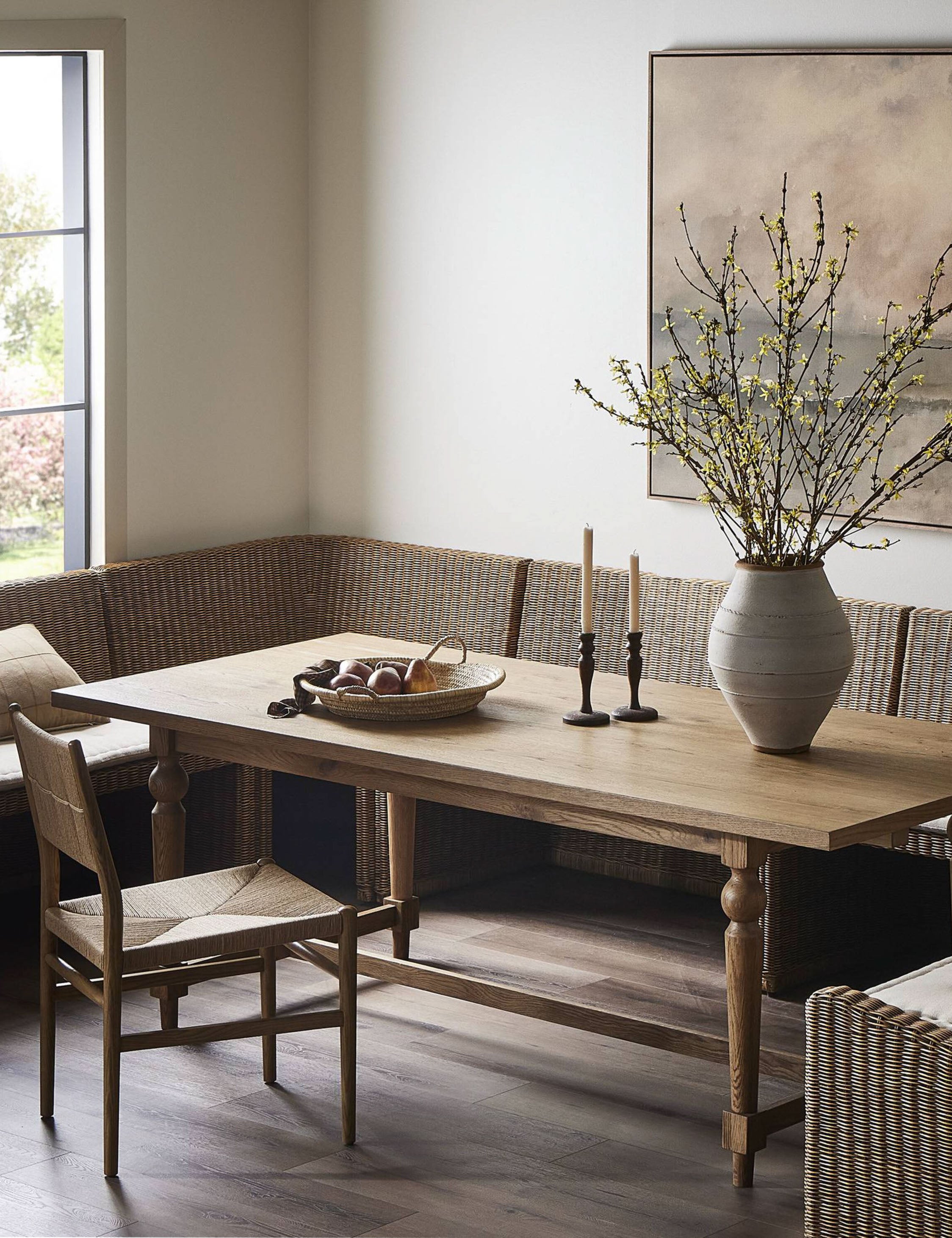 A dining nook featuring the Friese oak extendable dining table.