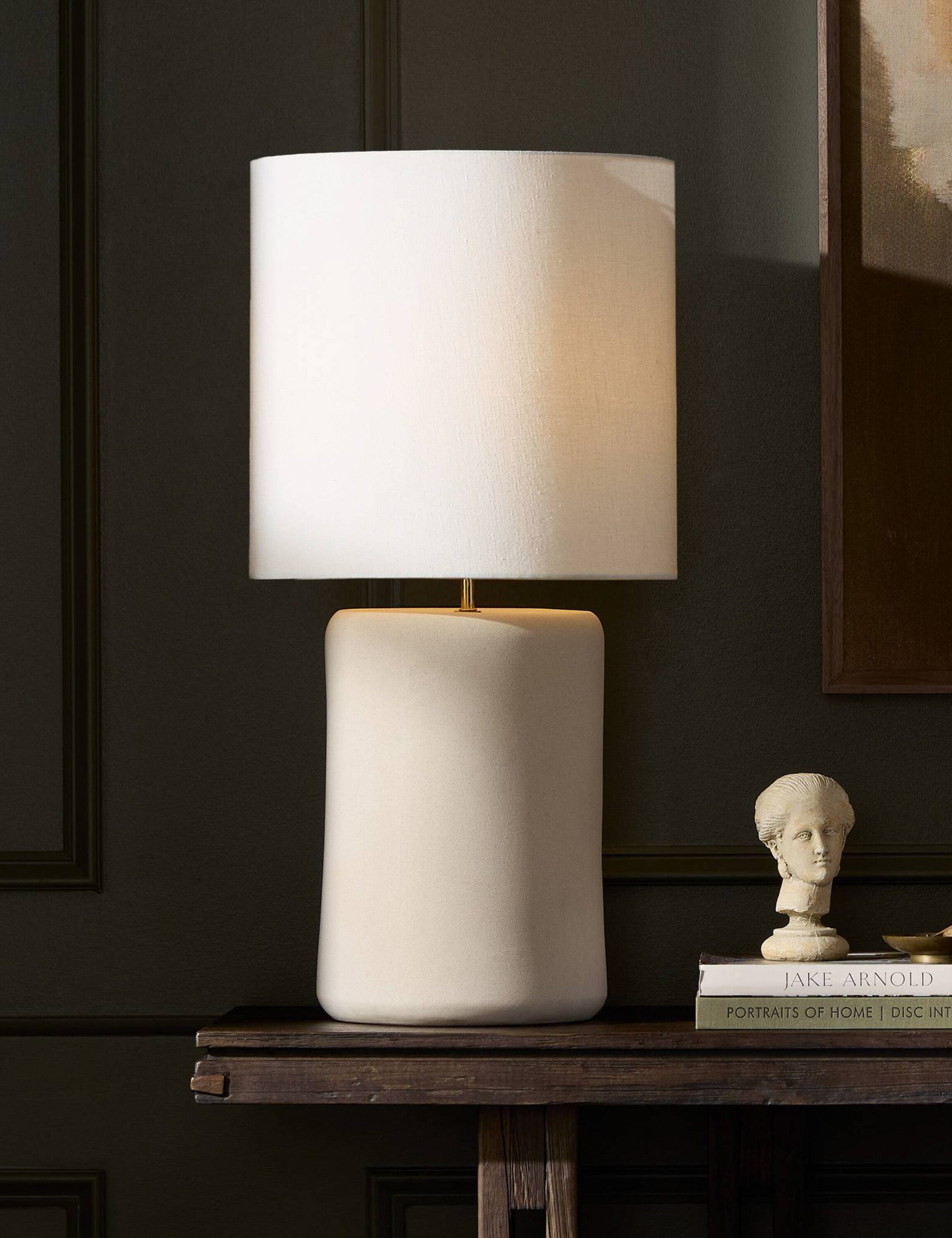 Elkin tone-on-tone design ceramic table lamp styled on a console table