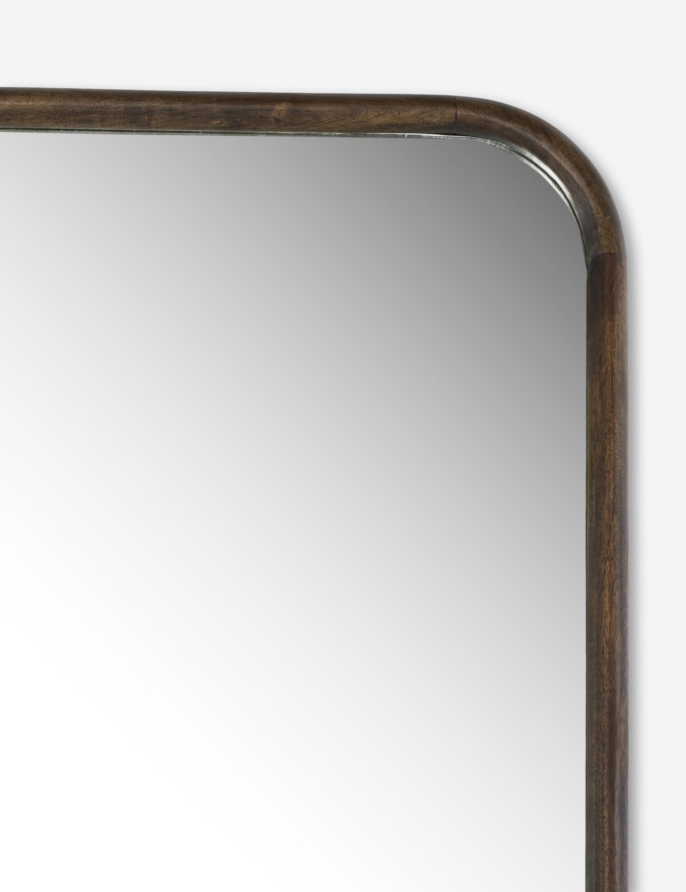 Close up of the frame of the Picart arched base slim frame floor mirror