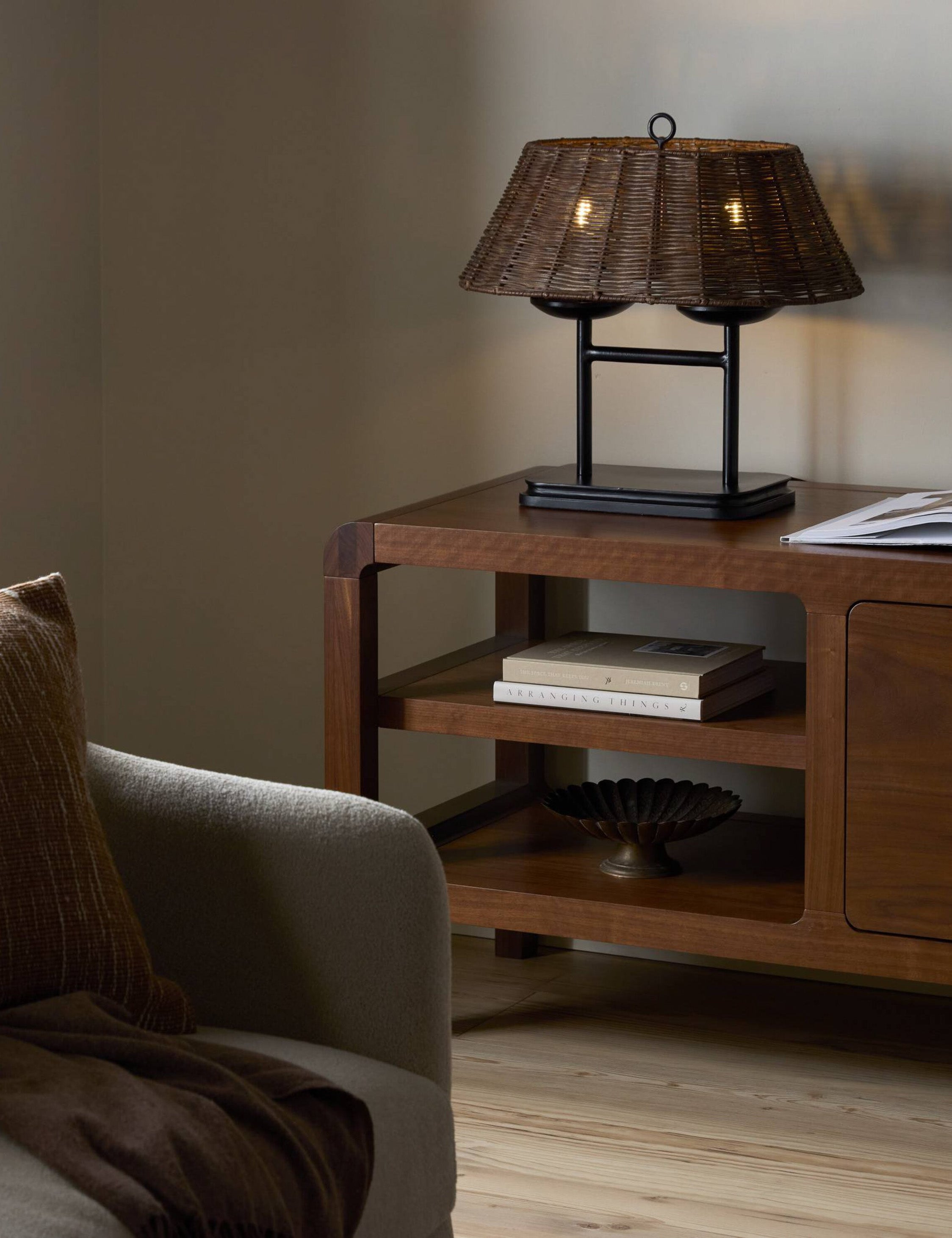 Teulon basketweave wicker double-post table lamp styled on a media console