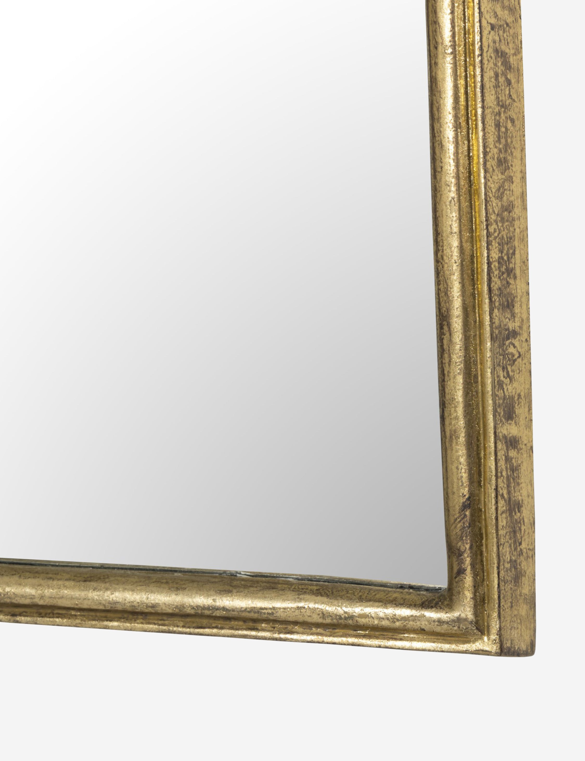 Close up of the Coudray serpentine gold leaf frame mantel mirror