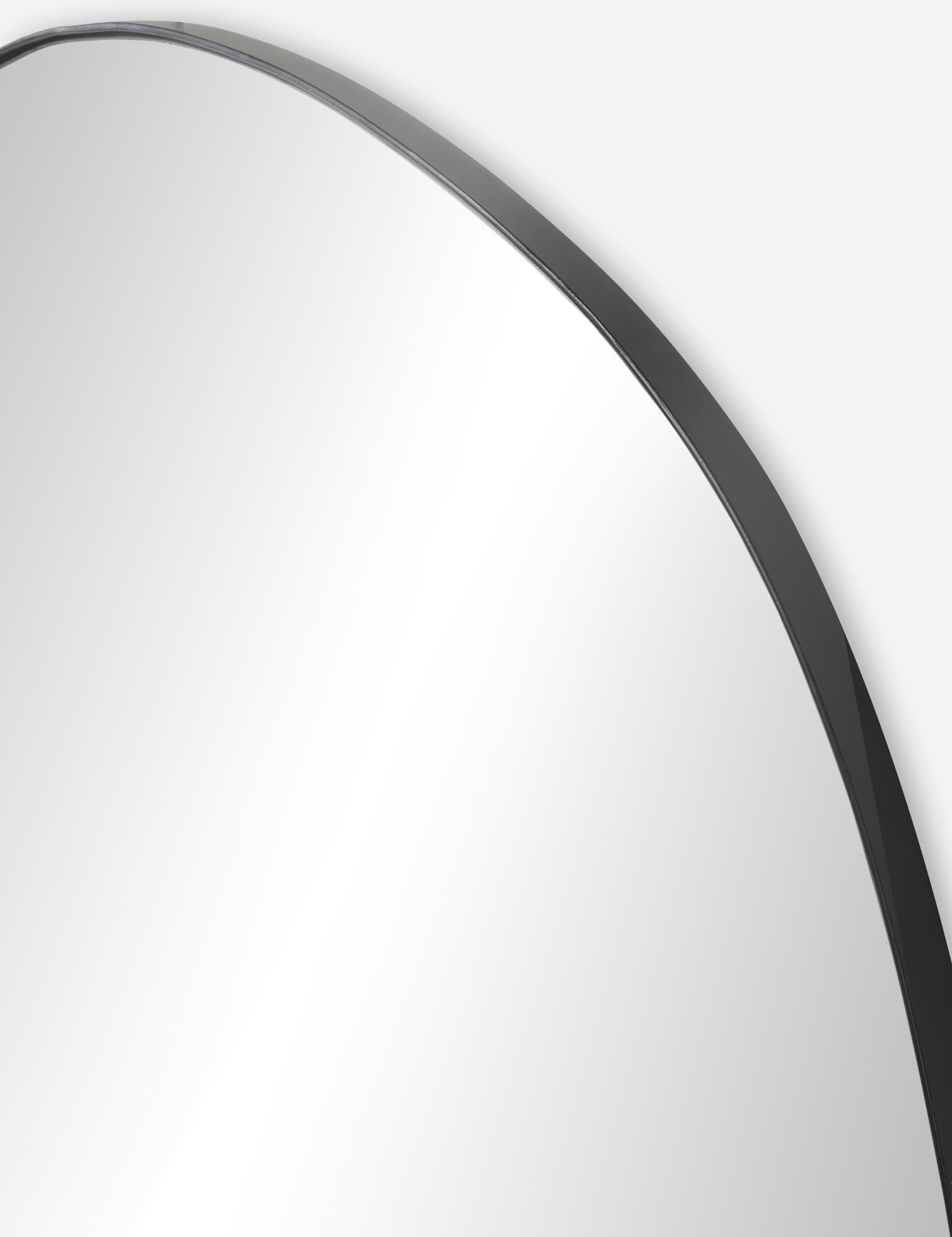 Close up of the frame of the Platero modern oval leaning floor mirror
