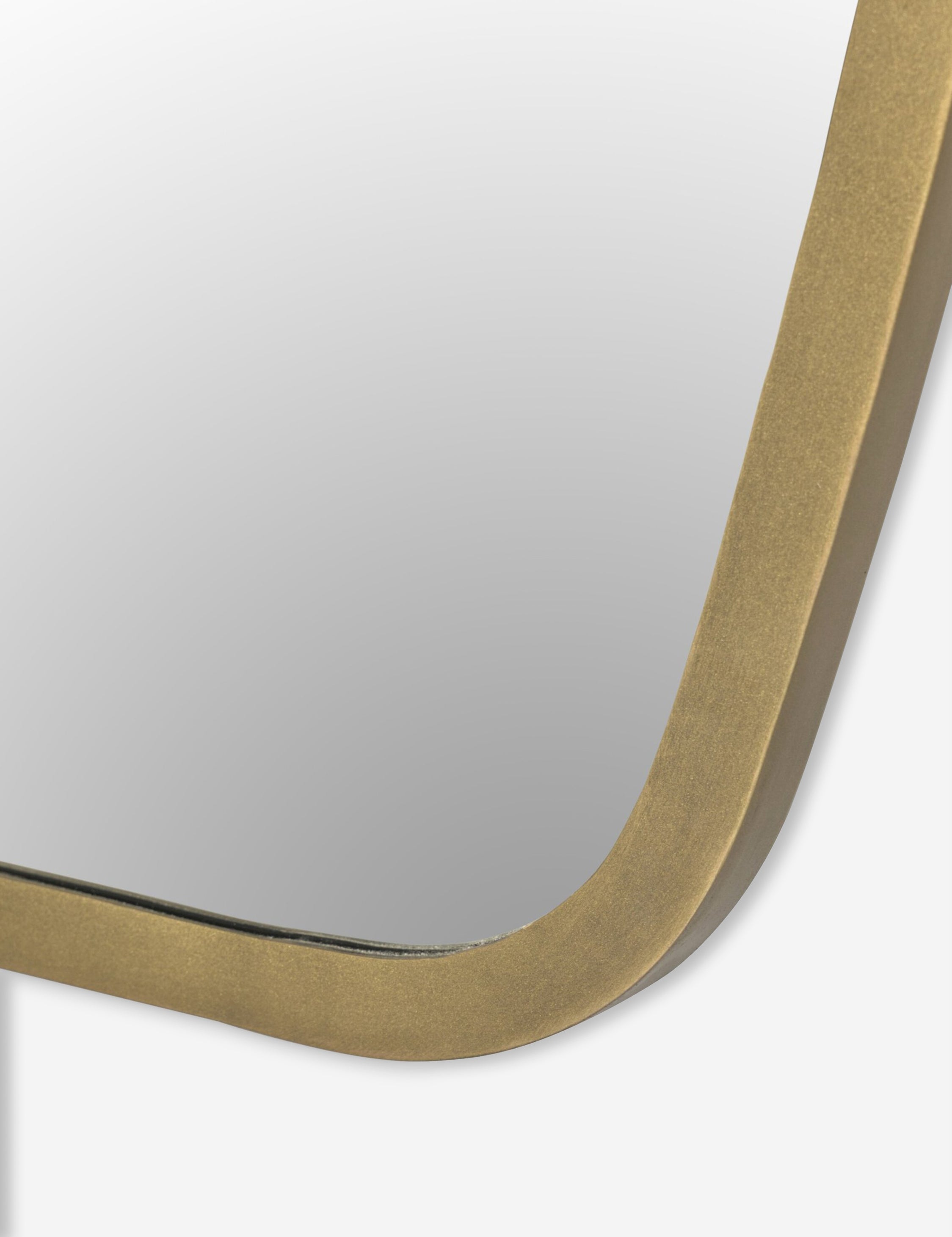 Close up of the Armond crest-shaped slim frame full length mirror