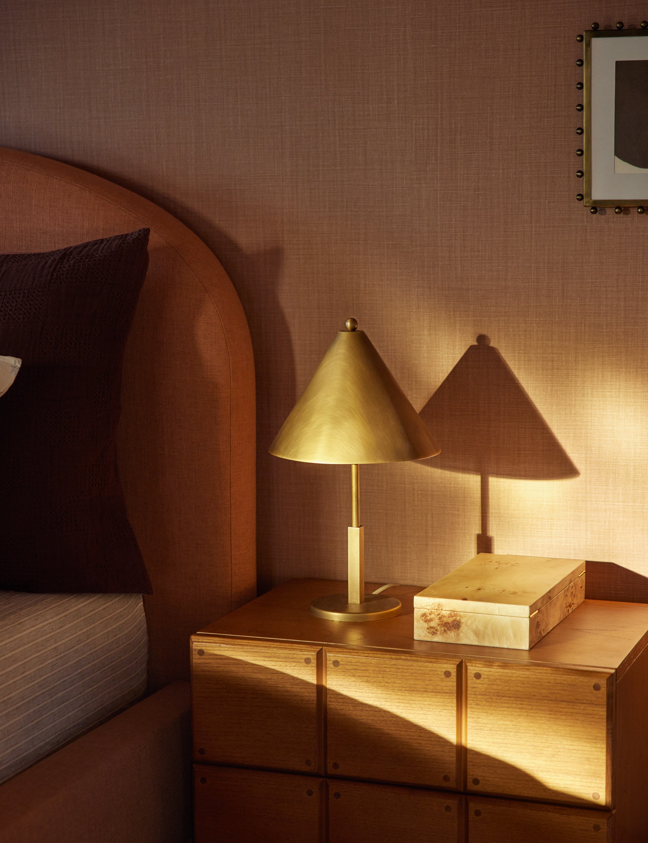 Tutton tapered metal shade table lamp styled on a bedside table