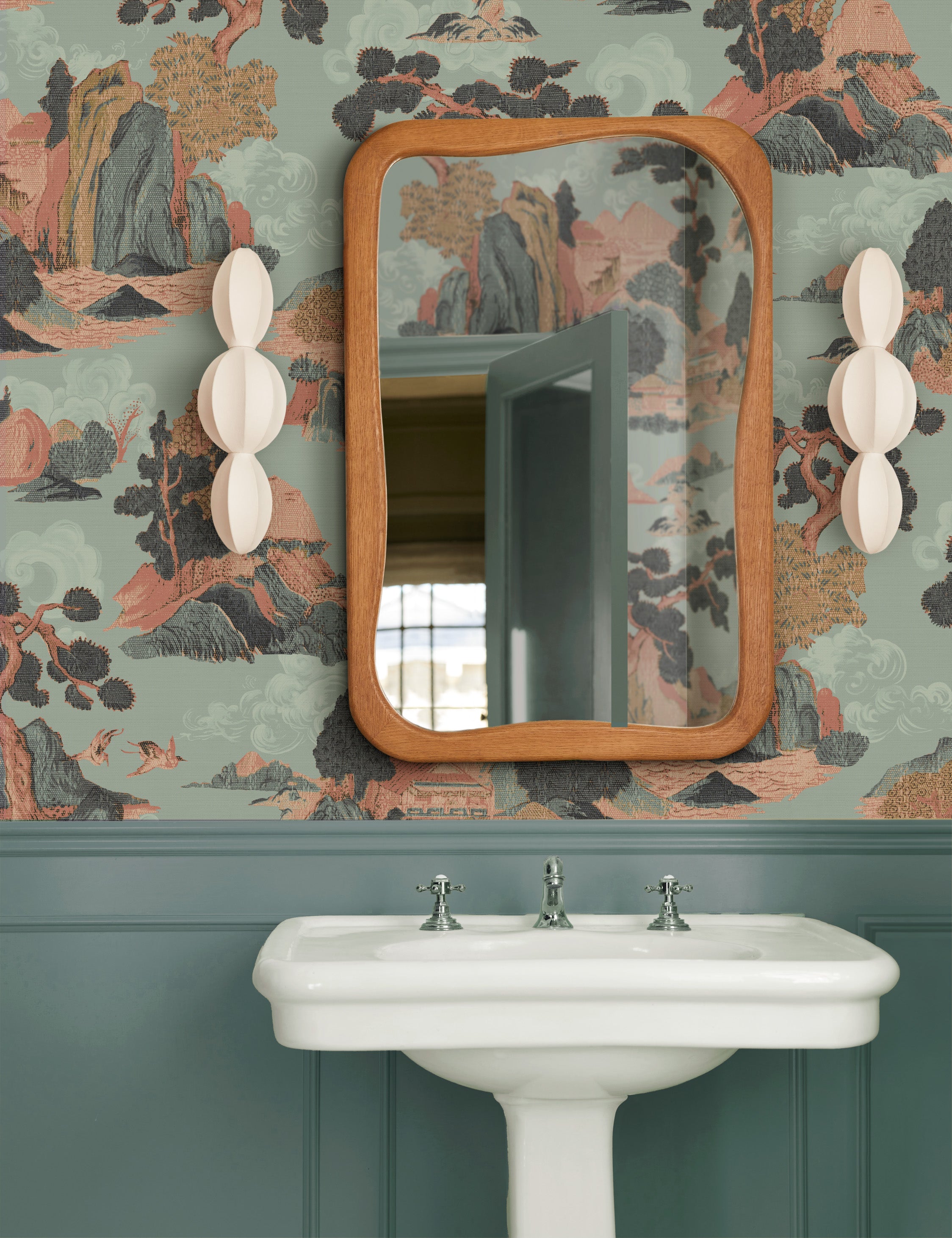 Galilea solid wavy wood frame mirror mirror by Aimee Song hung above a sink in a bathroom