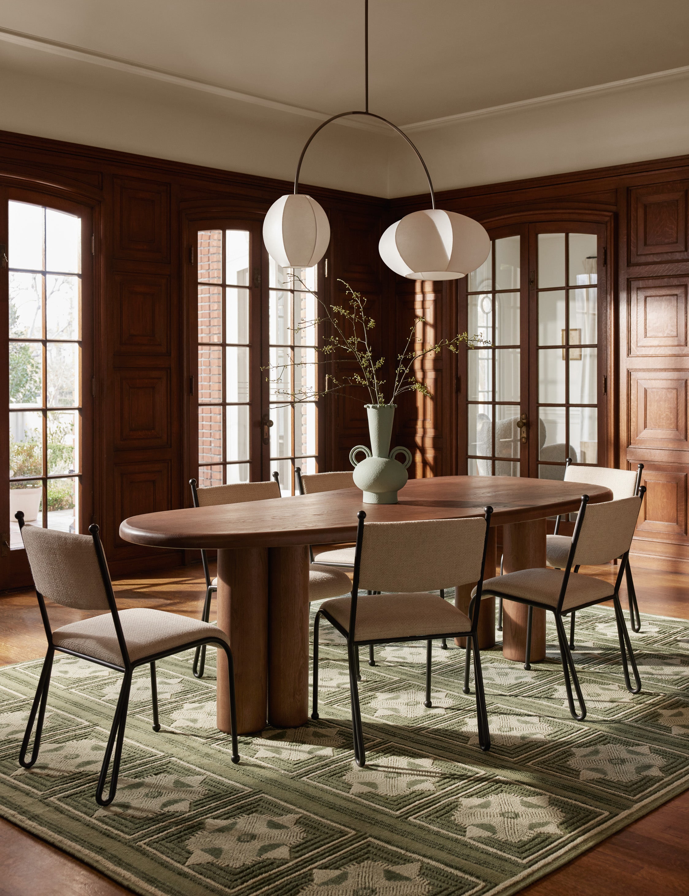 Dining room featuring the Carlisle Geometric Motif Hand-Knotted Wool Rug by Aimee Song