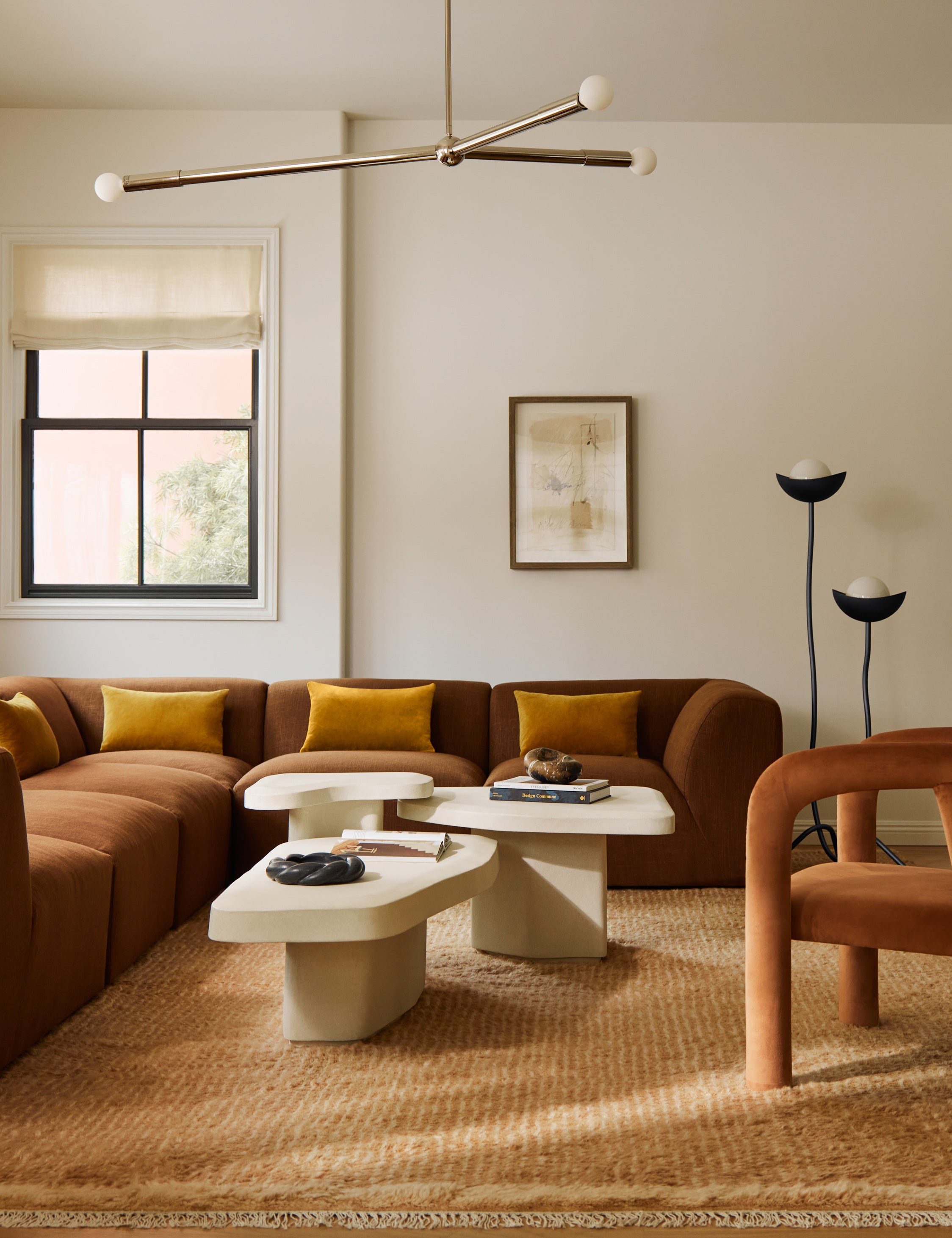 Living room featuring the Cyprus striped, tasseled, Moroccan-styled wool rug.