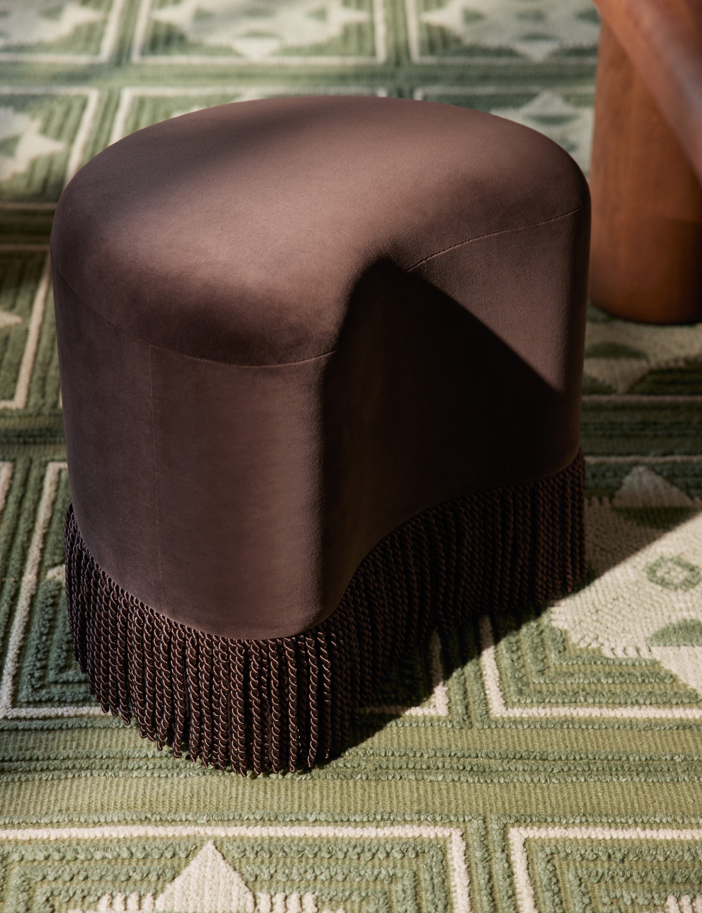Brahm sculptural velvet fringe accent stool by Aimee Song