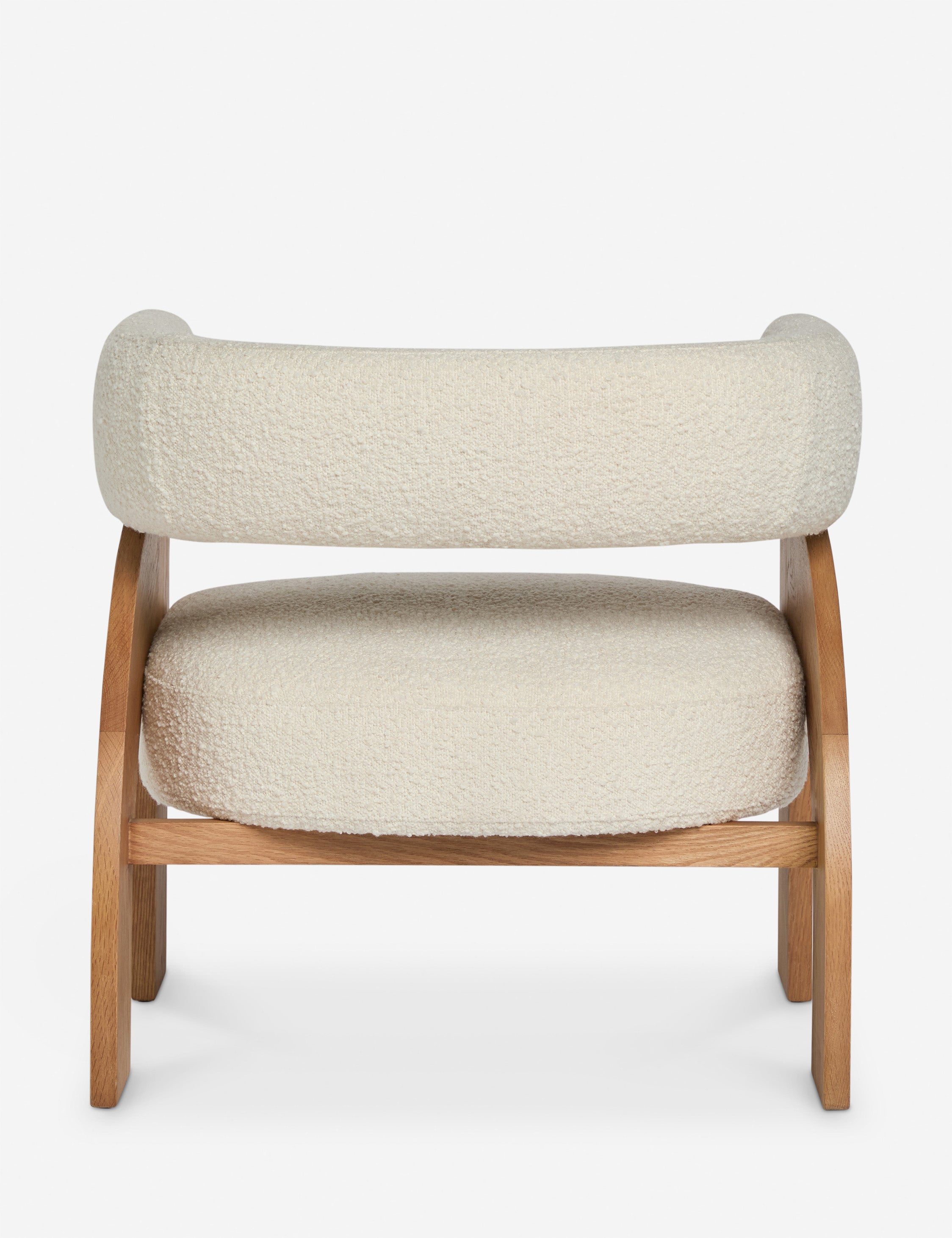 Back view of the Agacia barrel back boucle upholstered accent chair by Aimee Song
