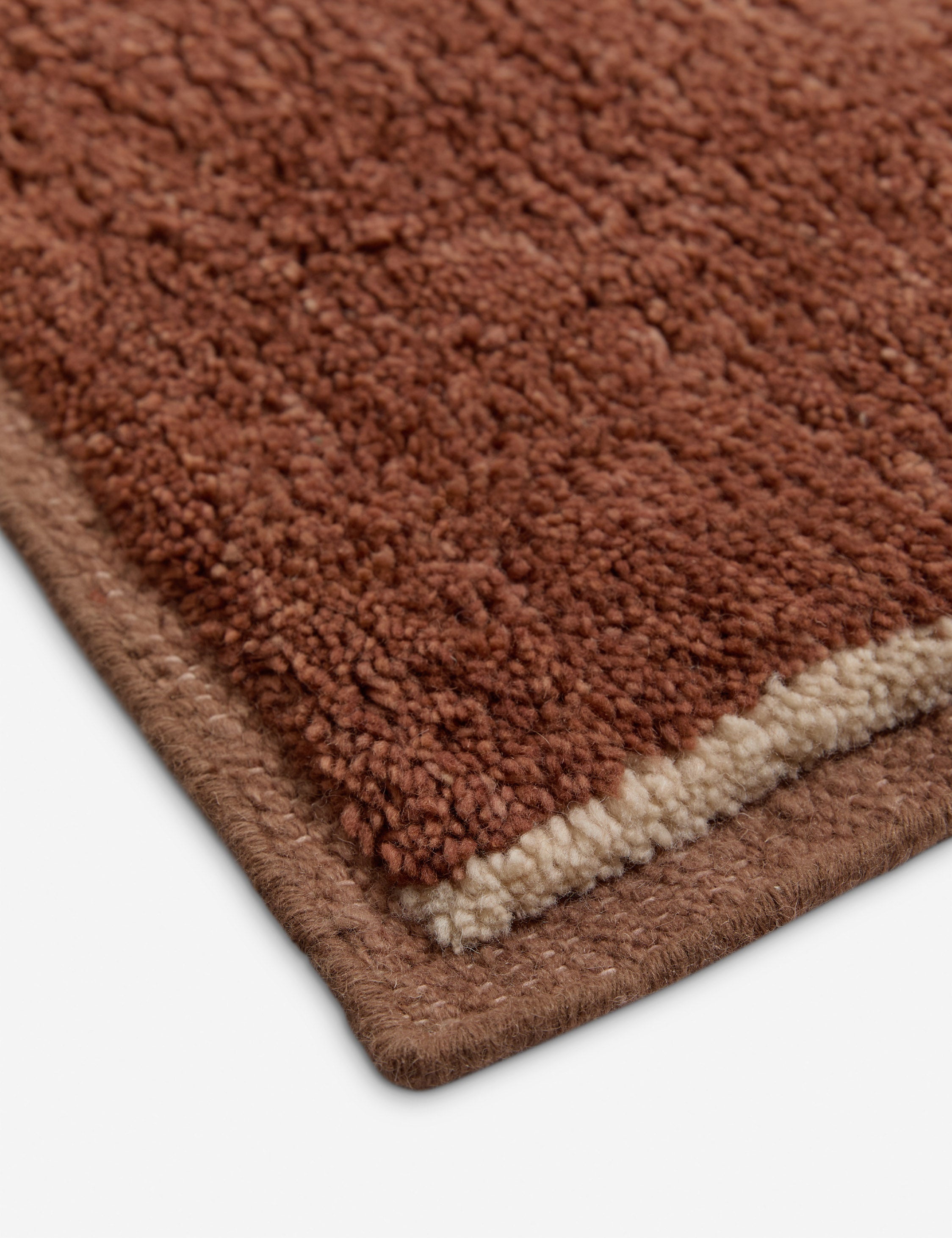 Close up view of the corner of the Amalfi Modern Organic Hand-Knotted Wool Rug by Aimee Song