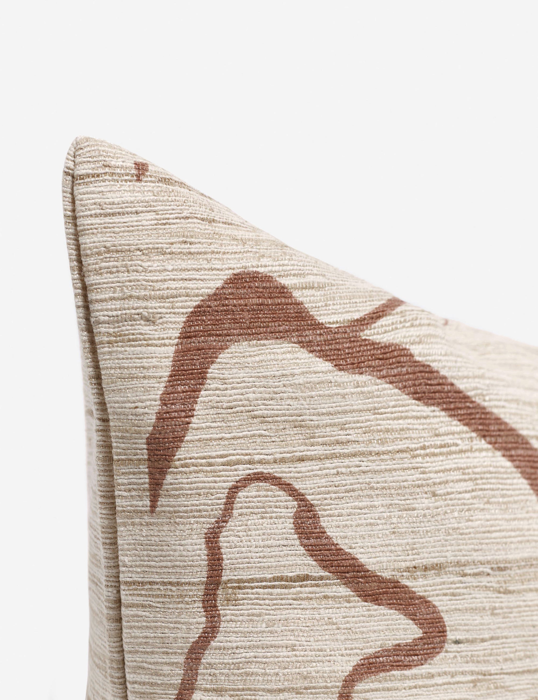 Corner shot of the Canyon Terracotta Square Pillow