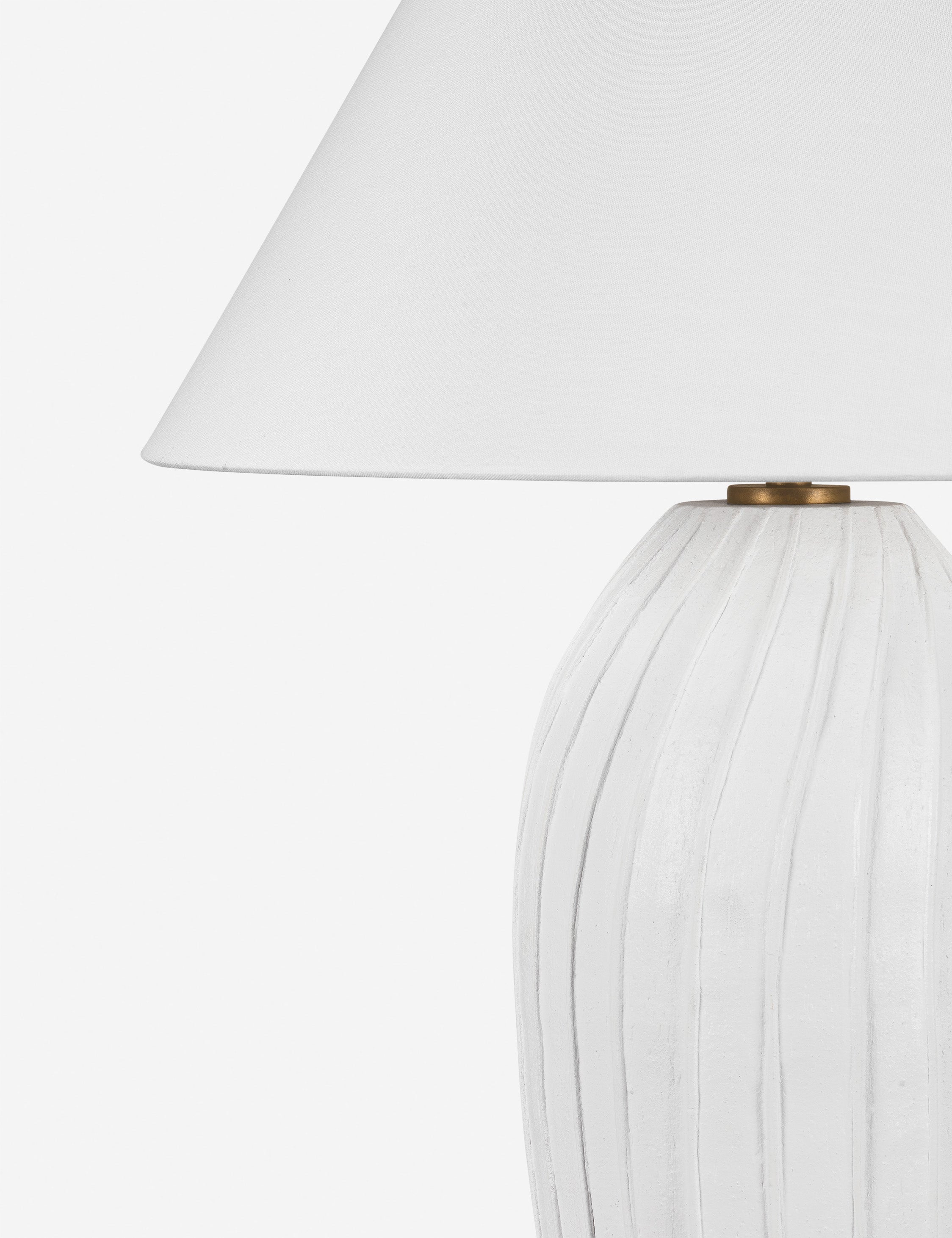 Close up of the Pama sculptural, pleated-detail ceramic table lamp