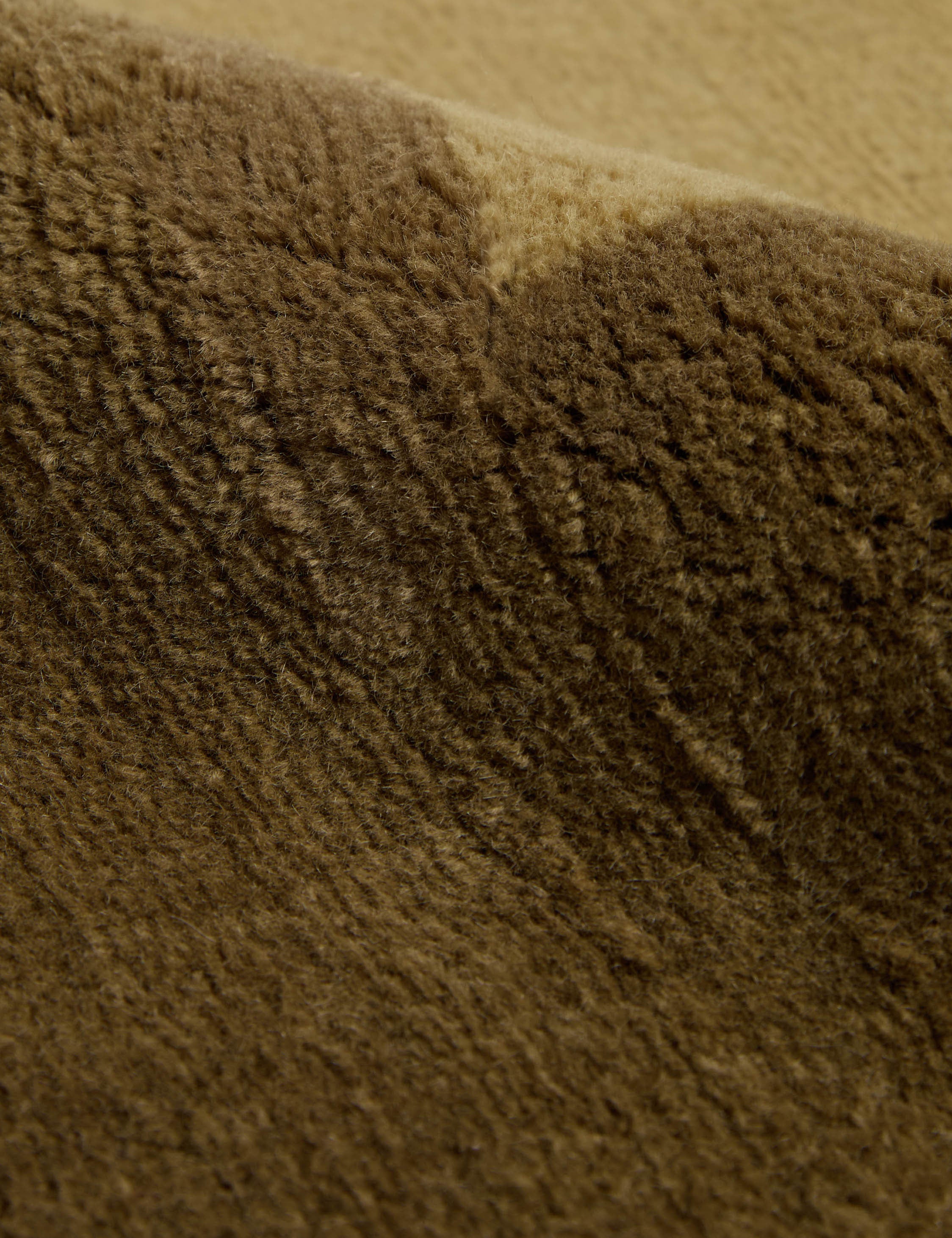Close up of the pile of the Deller Hand-Loomed Wool Rug by Jake Arnold