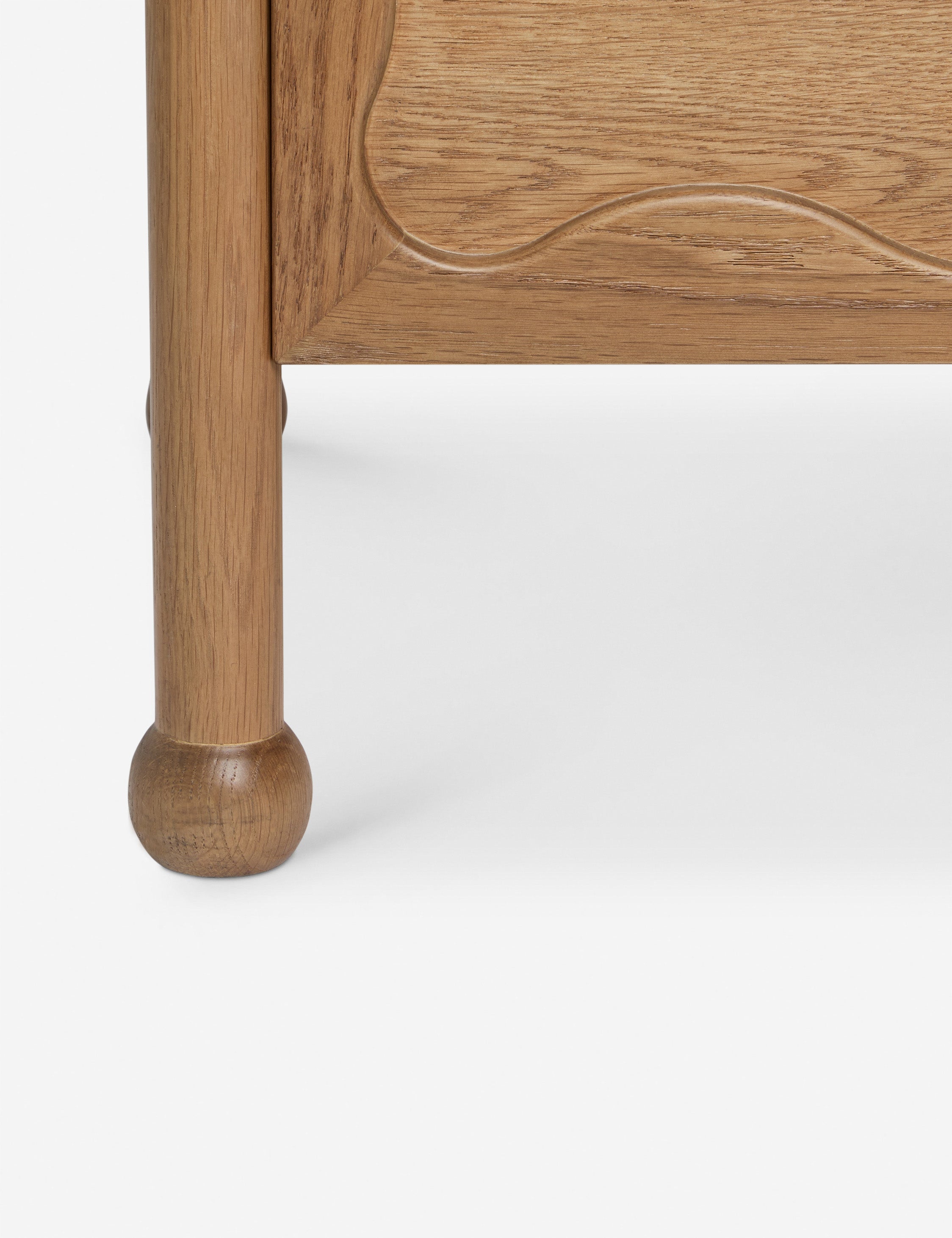 Close up of the Fontaine wavy detailing solid oak 6-drawer dresser by Aimee Song