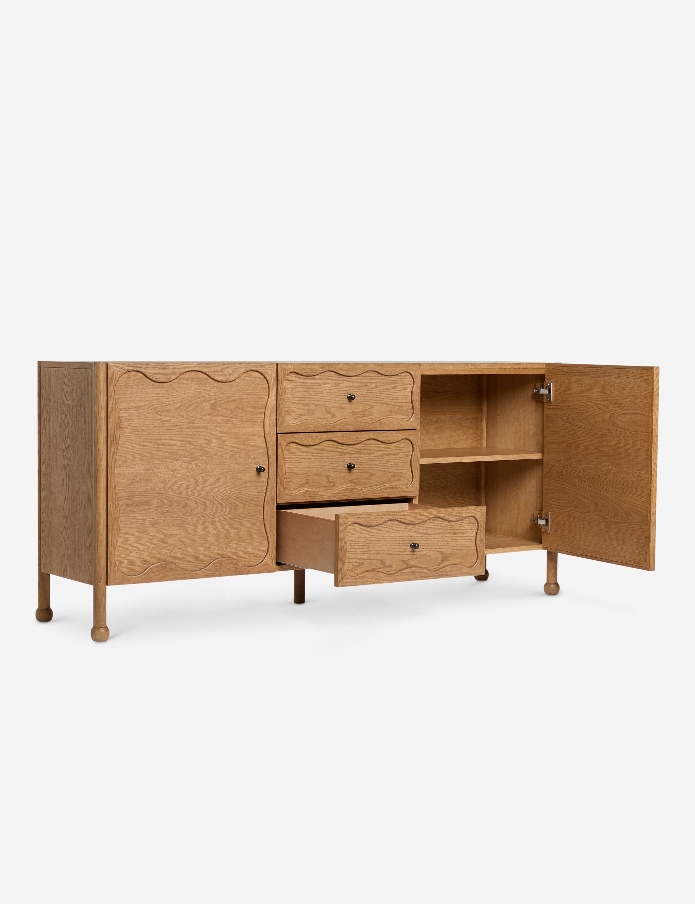 Fontaine wavy detailing solid oak sideboard by Aimee Song with one door and one drawer open