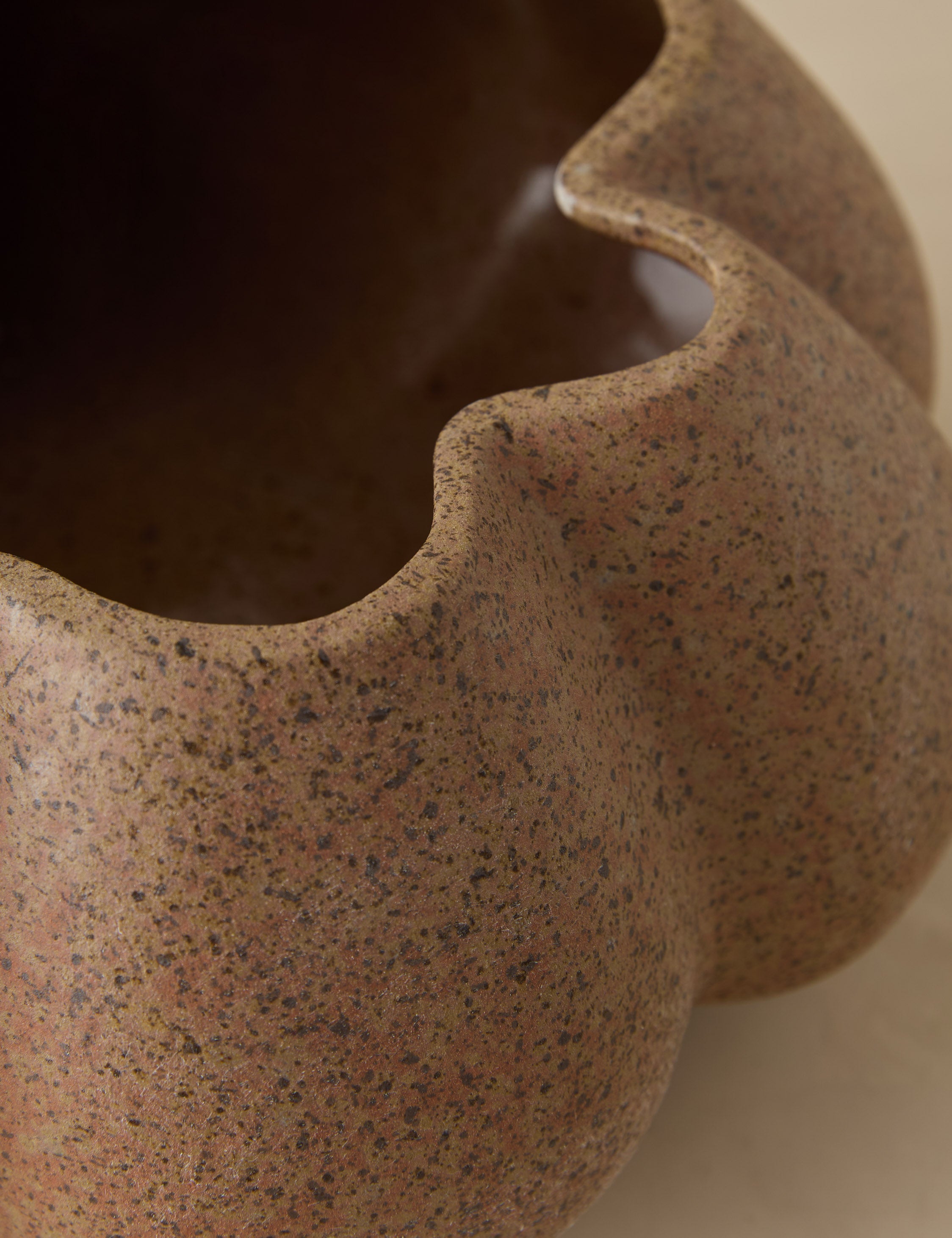 Close up view of the Inaki scalloped ceramic bowl by Aimee Song