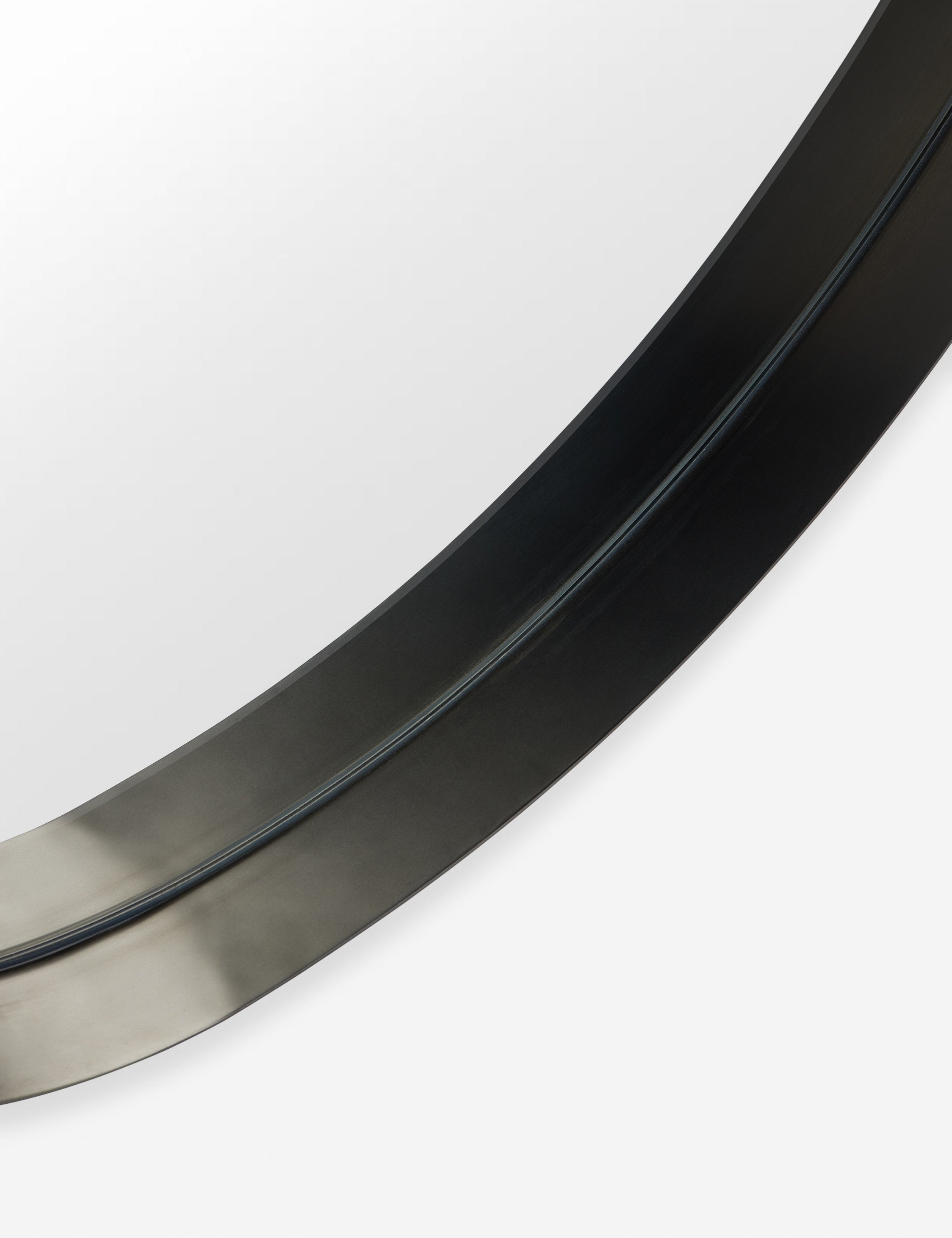 Close up view of the frame of the Leganza slim frame organic silhouette full length mirror by Aimee Song