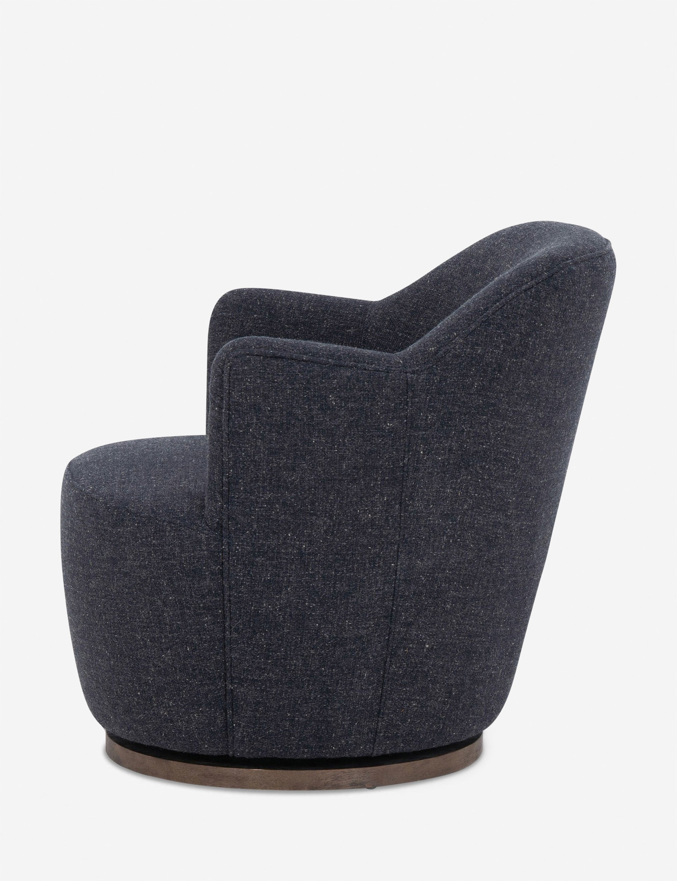 Side view of Margie rounded barrel swivel accent chair in slate