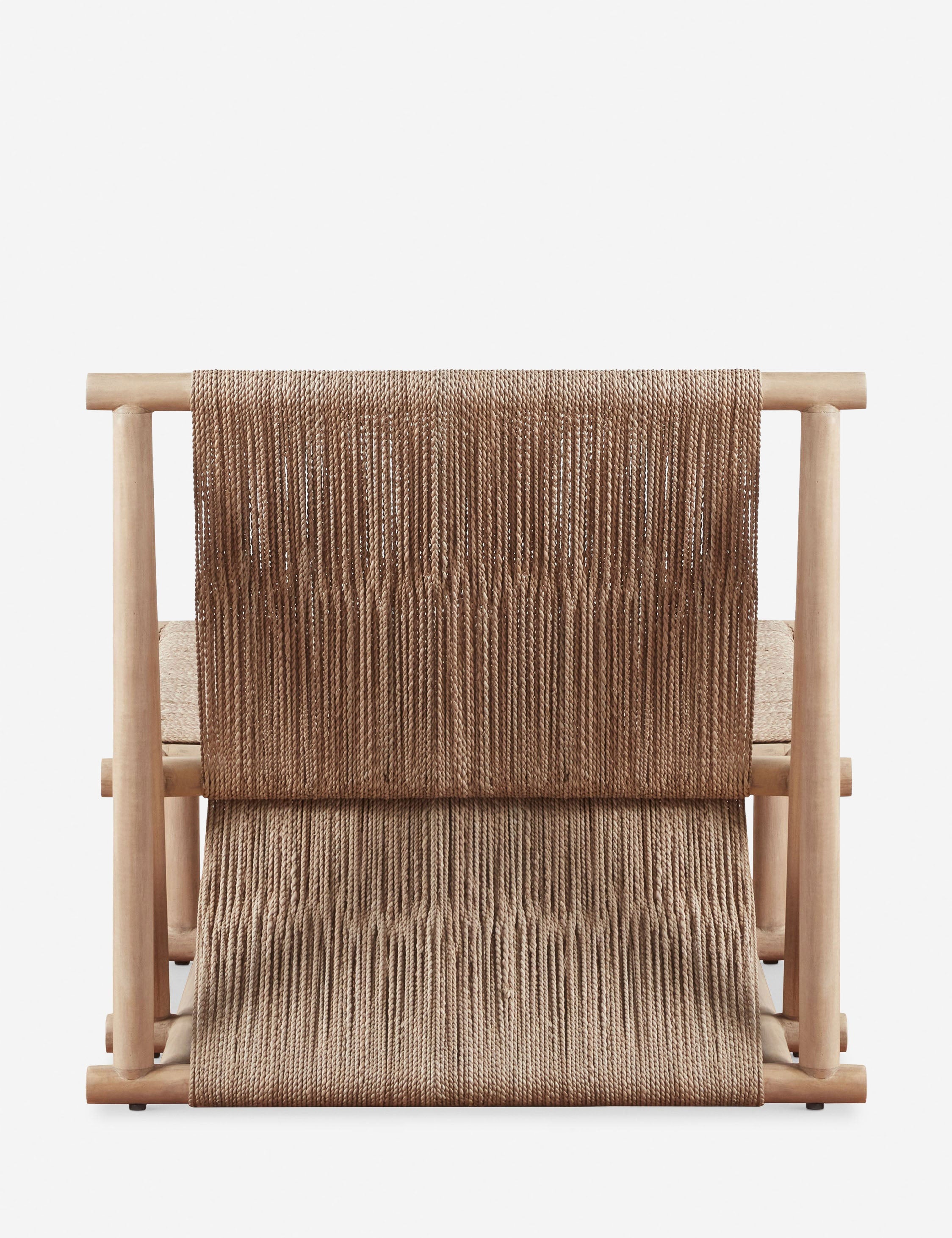Back of the Maritza armless light wood and woven seagrass coastal style accent chair.