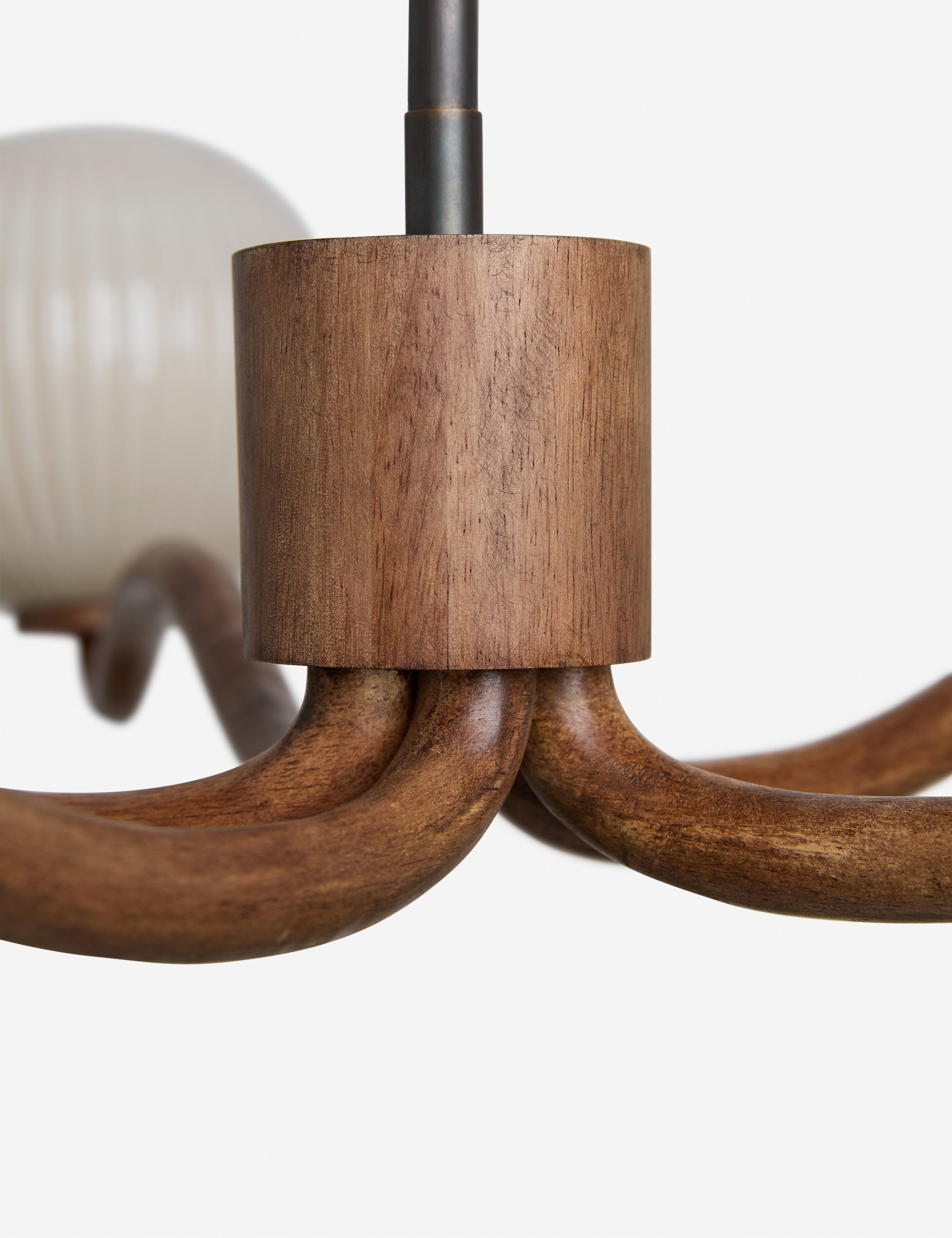 Close up view of the Nara fluted glass 5-globe chandelier by Aimee Song