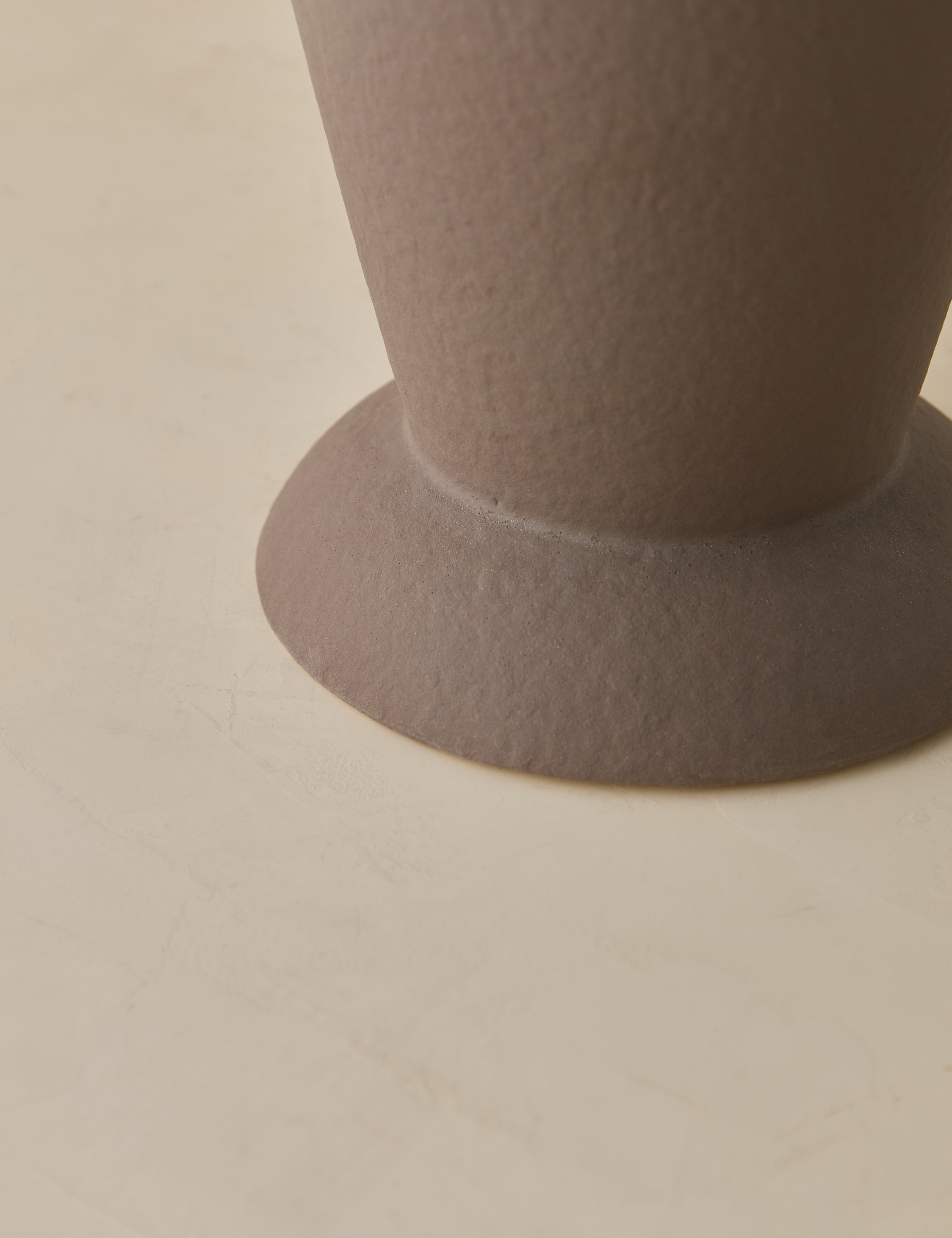 Close up view of the Panthea textural tapered loop handle ceramic vase by Aimee Song