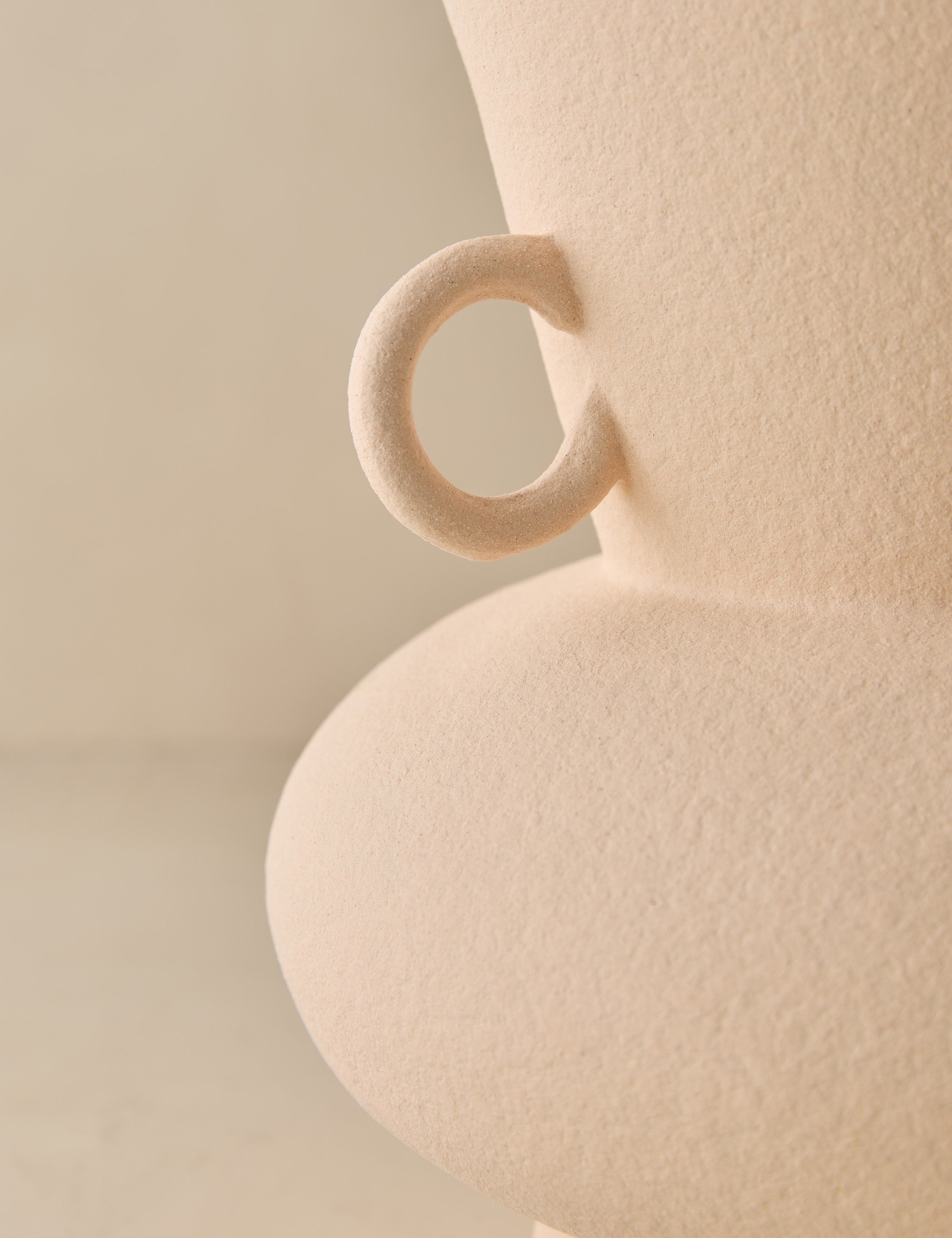 Close up view of the Philia wide beaded rim loop handle ceramic vase by Aimee Song