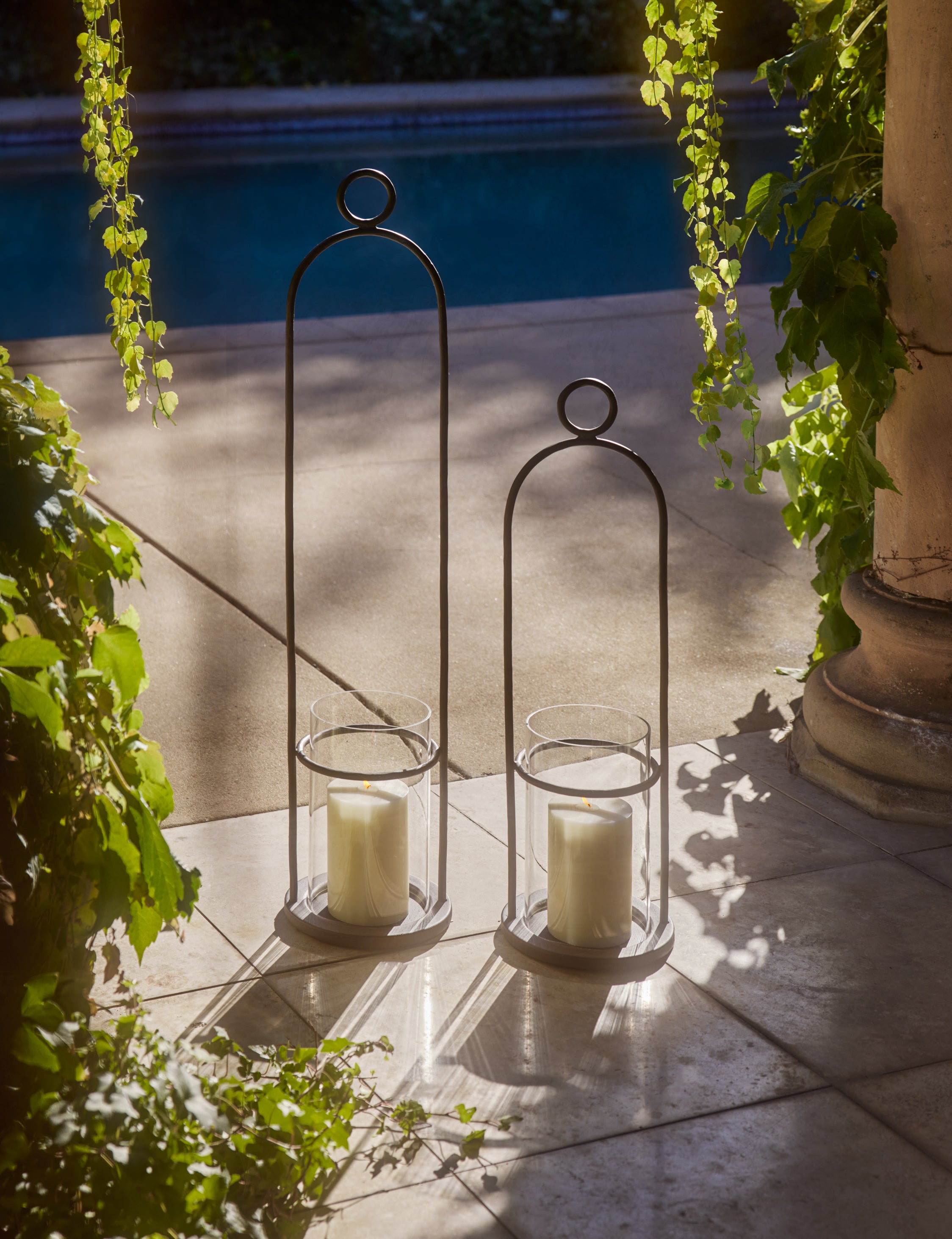 Two Kibby iron Lanterns by Sarah Sherman Samuel in the large and small size