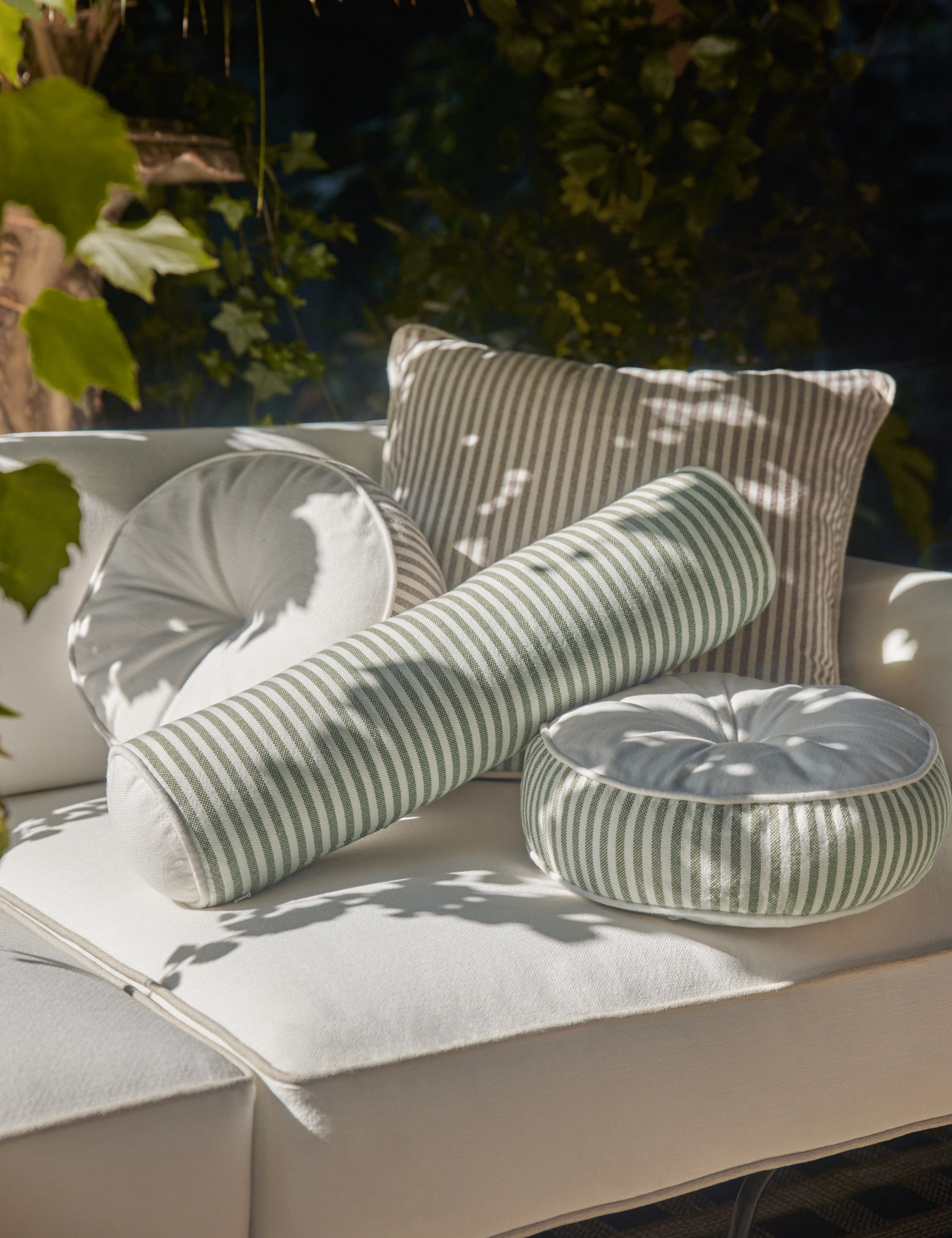 Various Littu Pillows by Sarah Sherman Samuel in different colors and sizes.