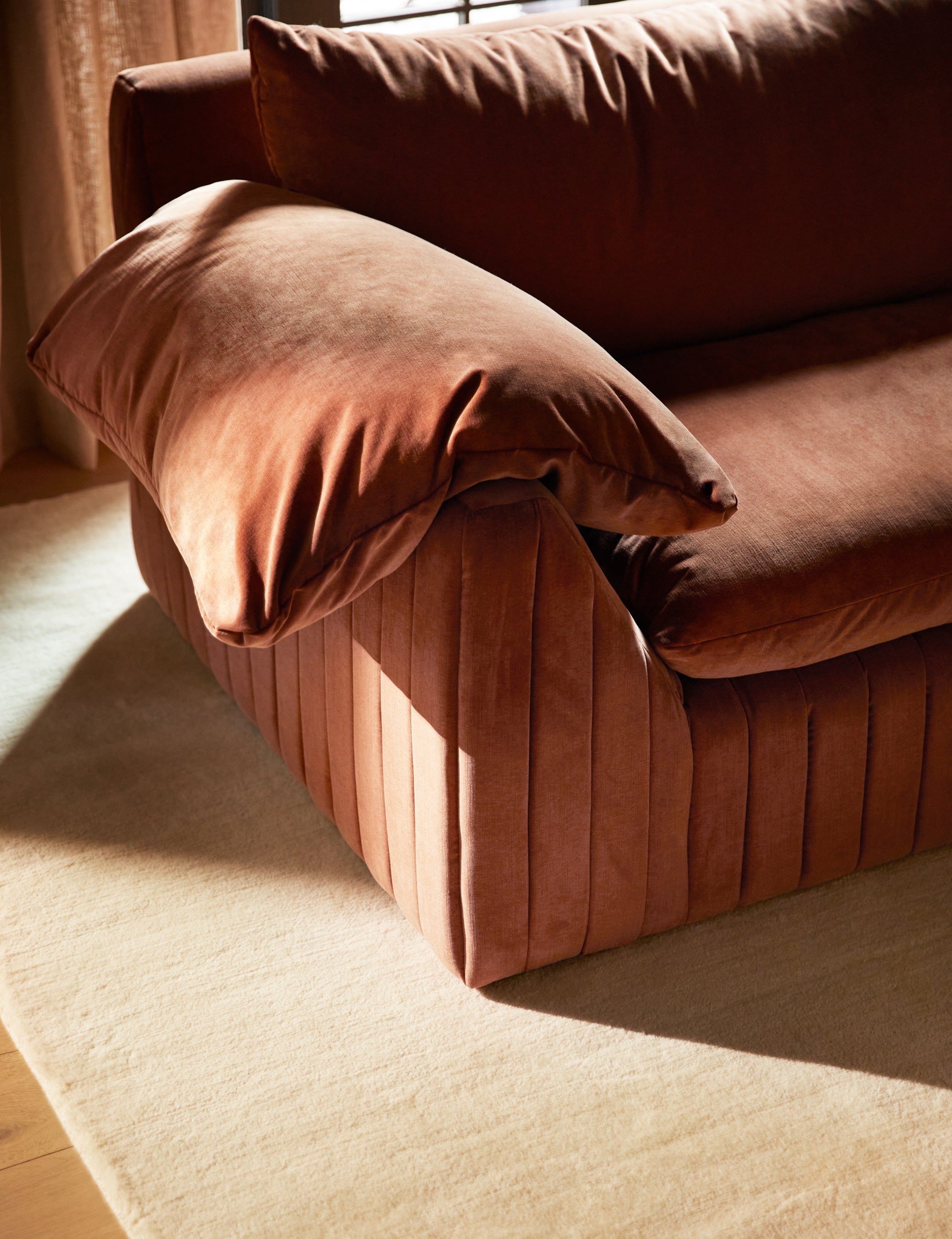  Close up of the arm of the Yucca relaxed profile wide arm sofa by Carly Cushnie.
