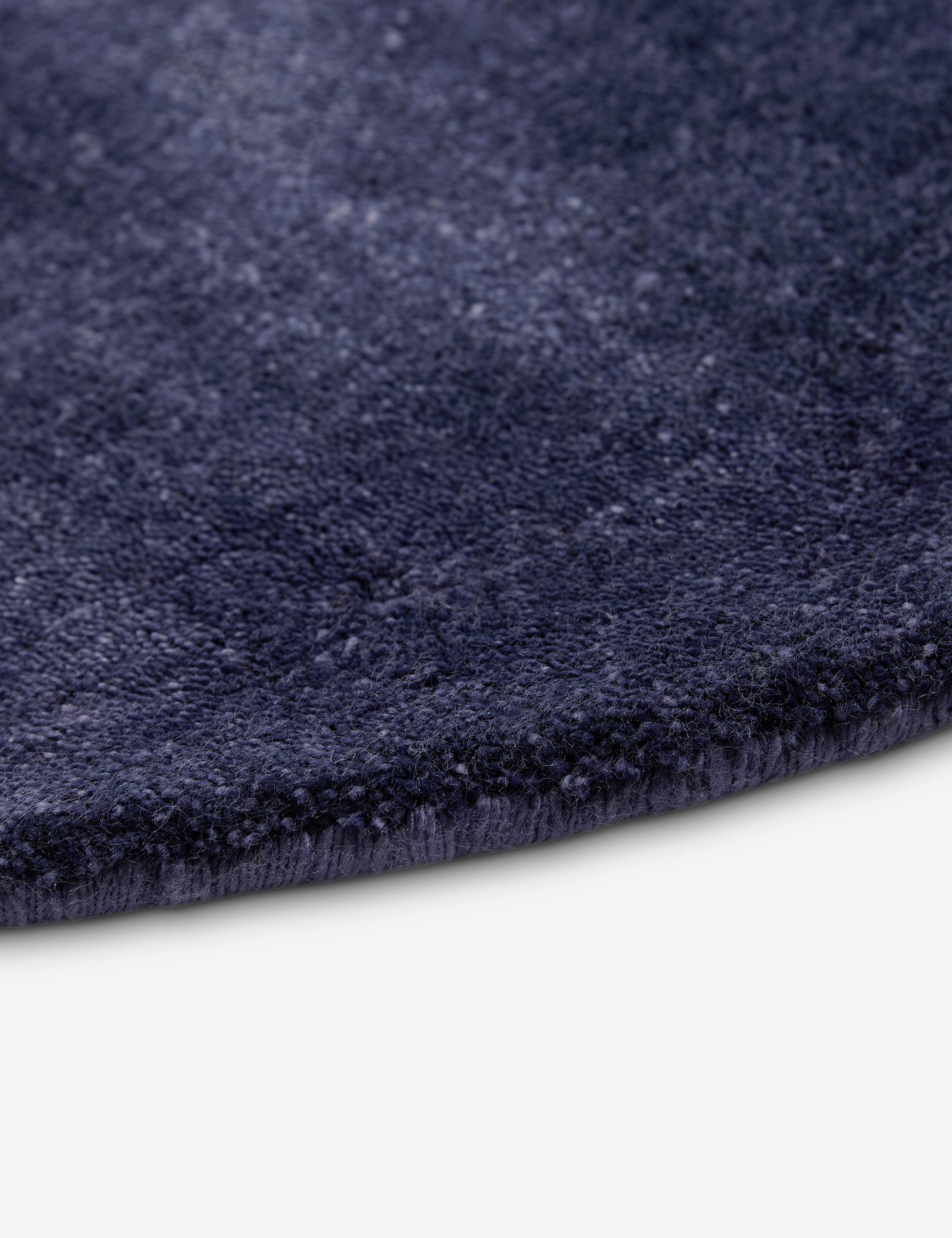 Close up view of the Sutton Solid Color Hand-Loomed Viscose Rug by Aimee Song