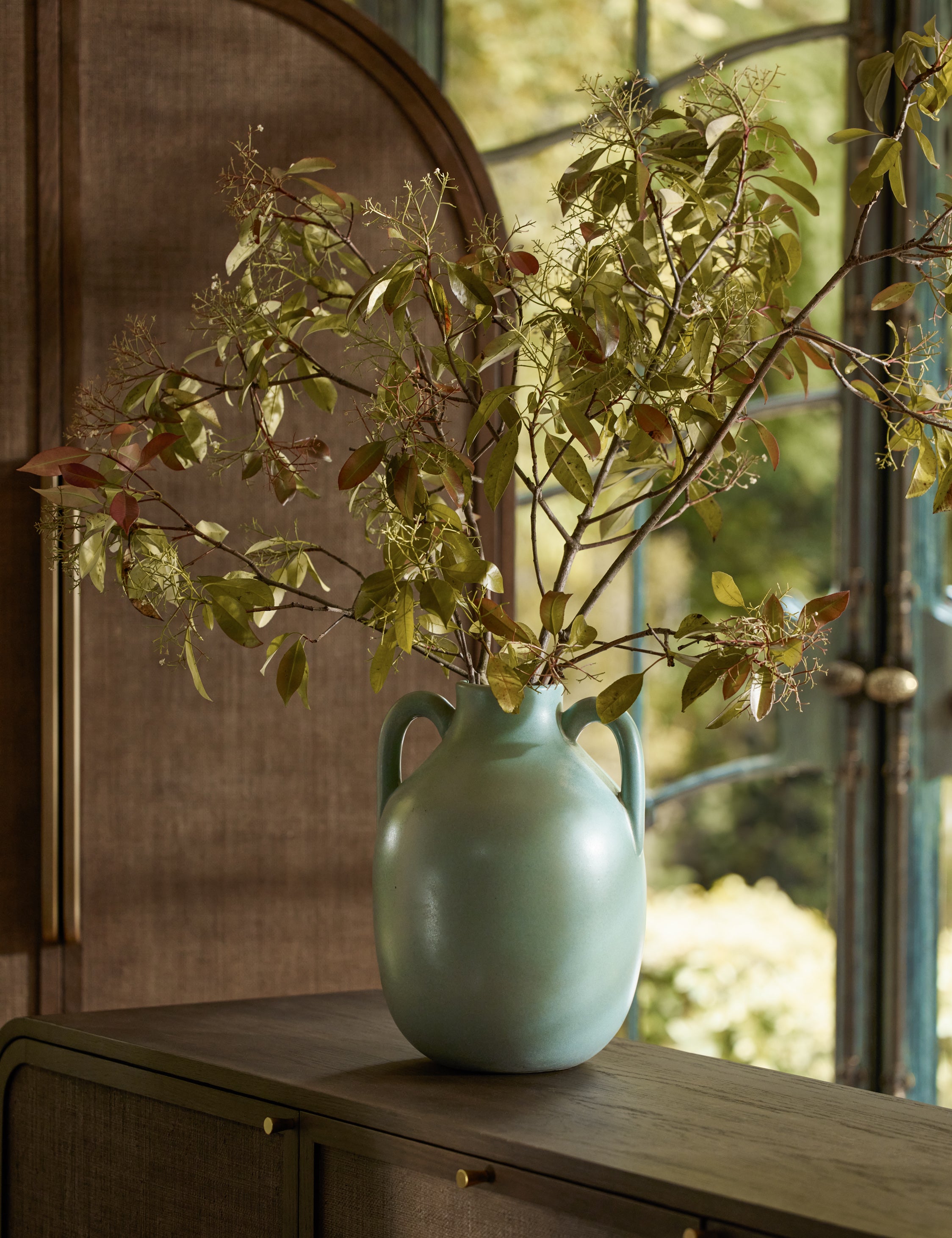 Niara Vase with loop handles.