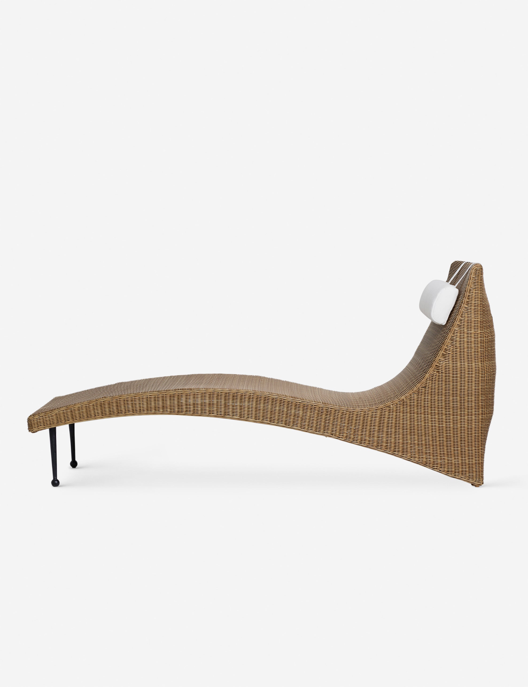 Side profile of the Marisol sculptural wicker outdoor chaise by Sarah Sherman Samuel.