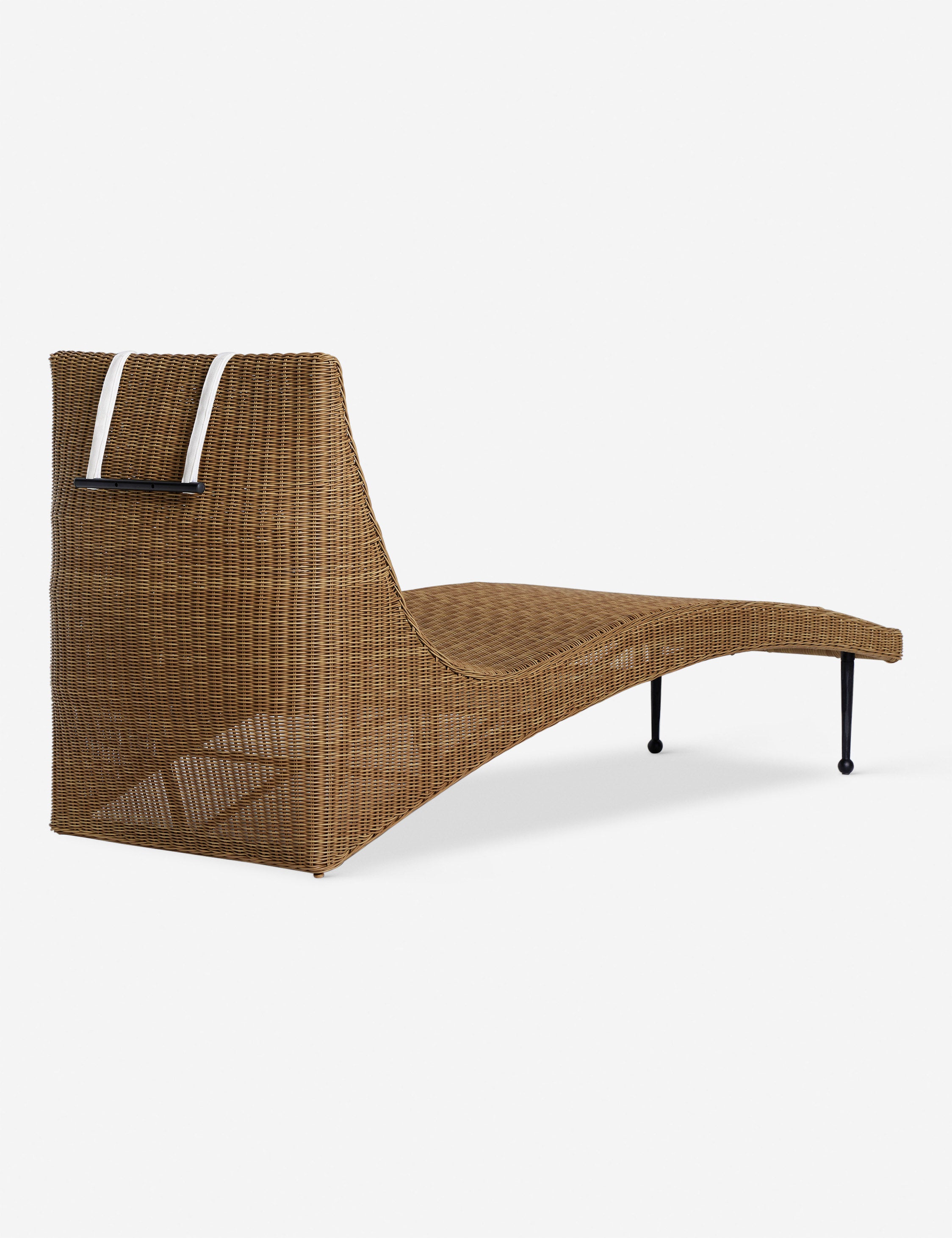 Angled back view of the Marisol sculptural wicker outdoor chaise by Sarah Sherman Samuel.