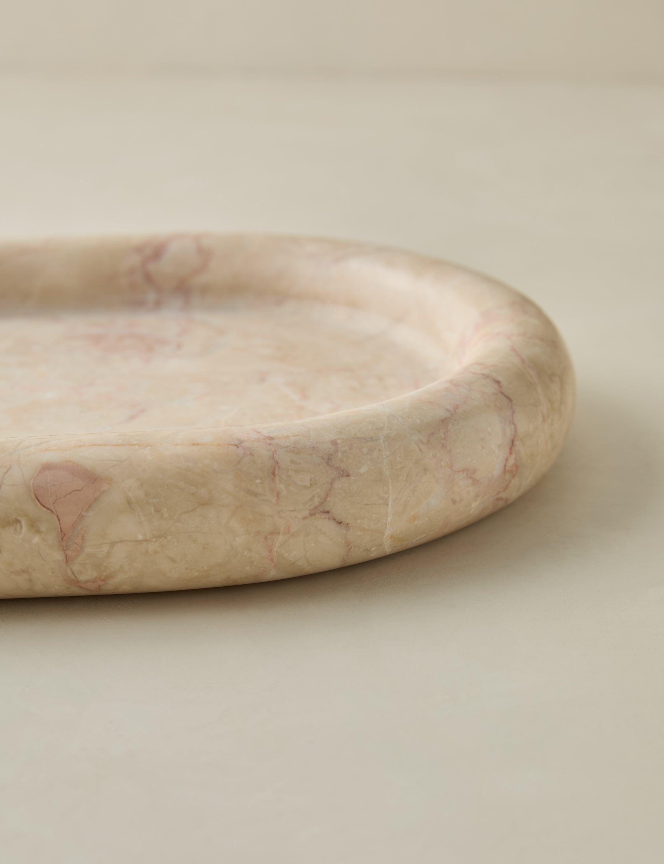 Close up of the Besser oval marble tray.