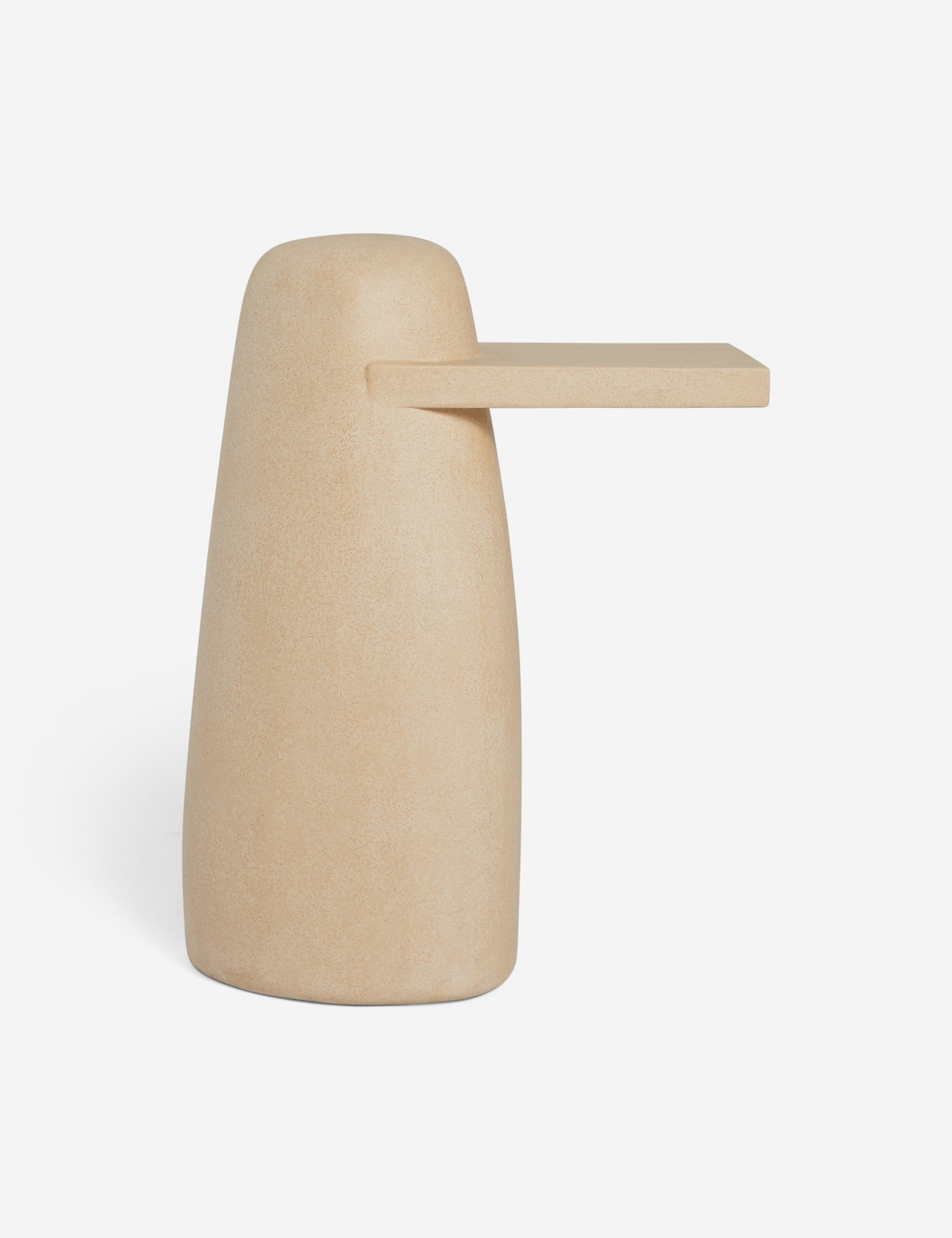 Side view of the Quarry sculptural concrete side table