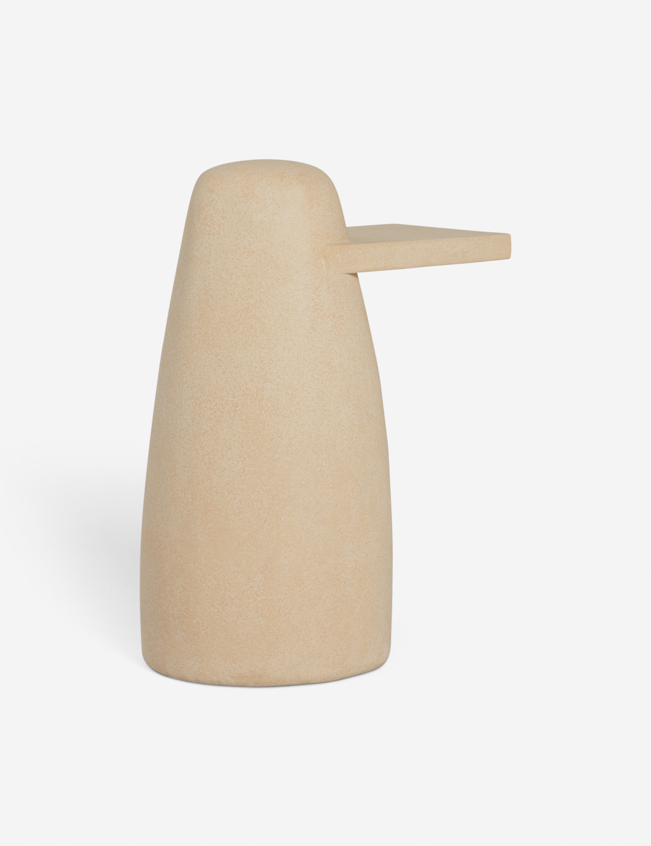 Angled view of the Quarry sculptural concrete side table