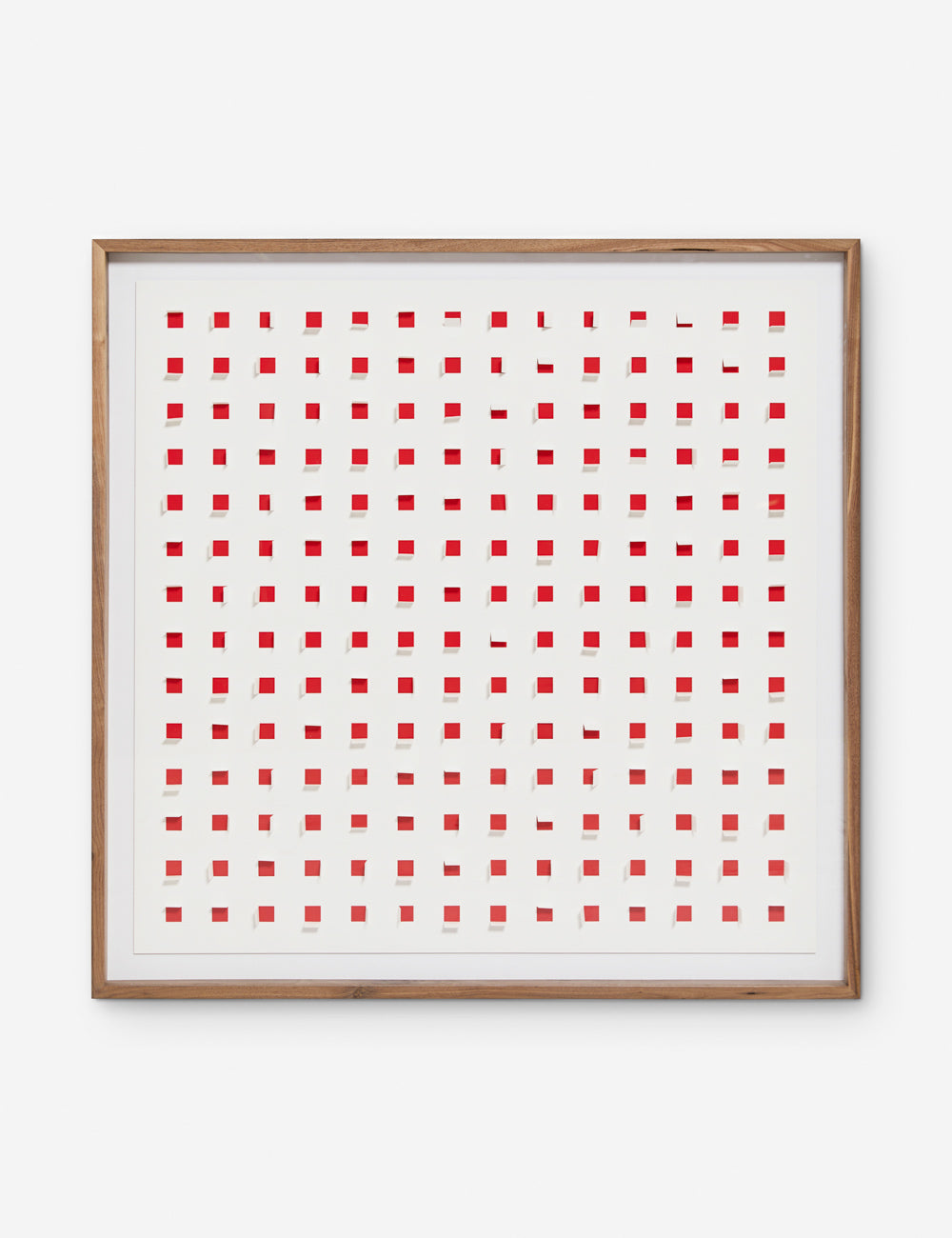 See Through cherry red and white wall art featuring square paper cutouts with flaps on a linen backdrop