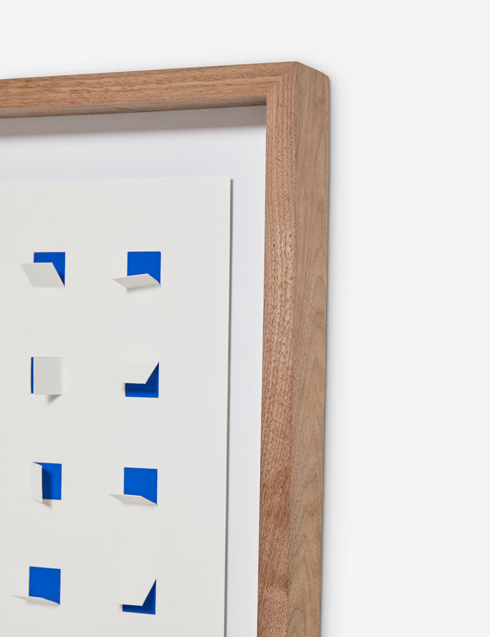 Corner of the See through cobalt blue and white wall art