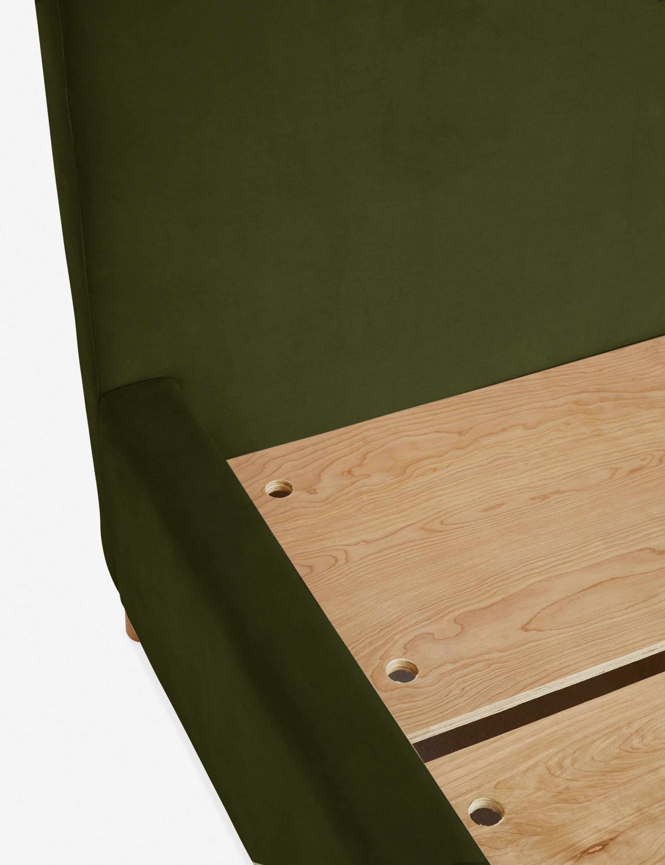 Close-up of the wooden support beams inside the base of the Solene Loden Velvet platform bed