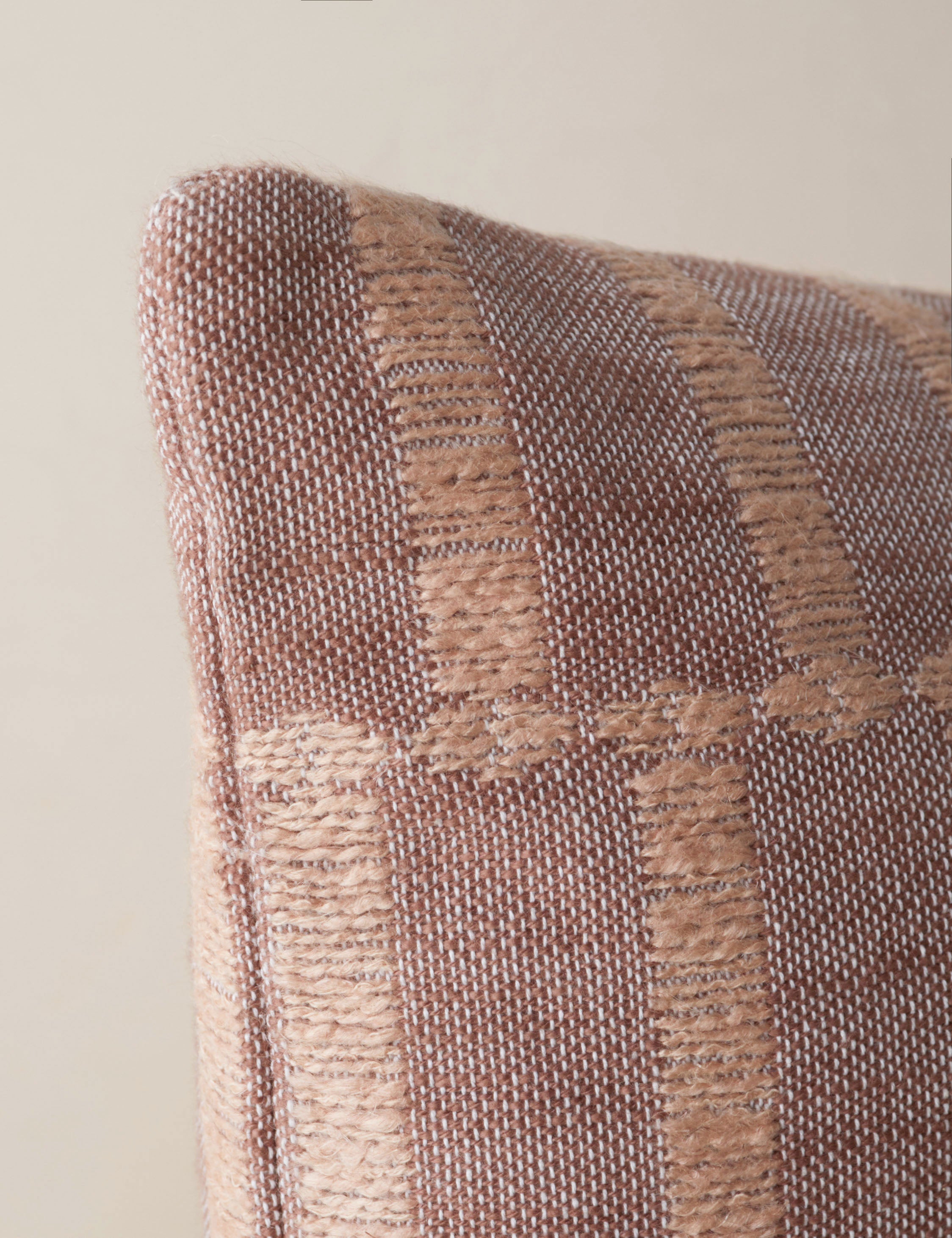 Corner of the Thisbe offset stripe pillow.