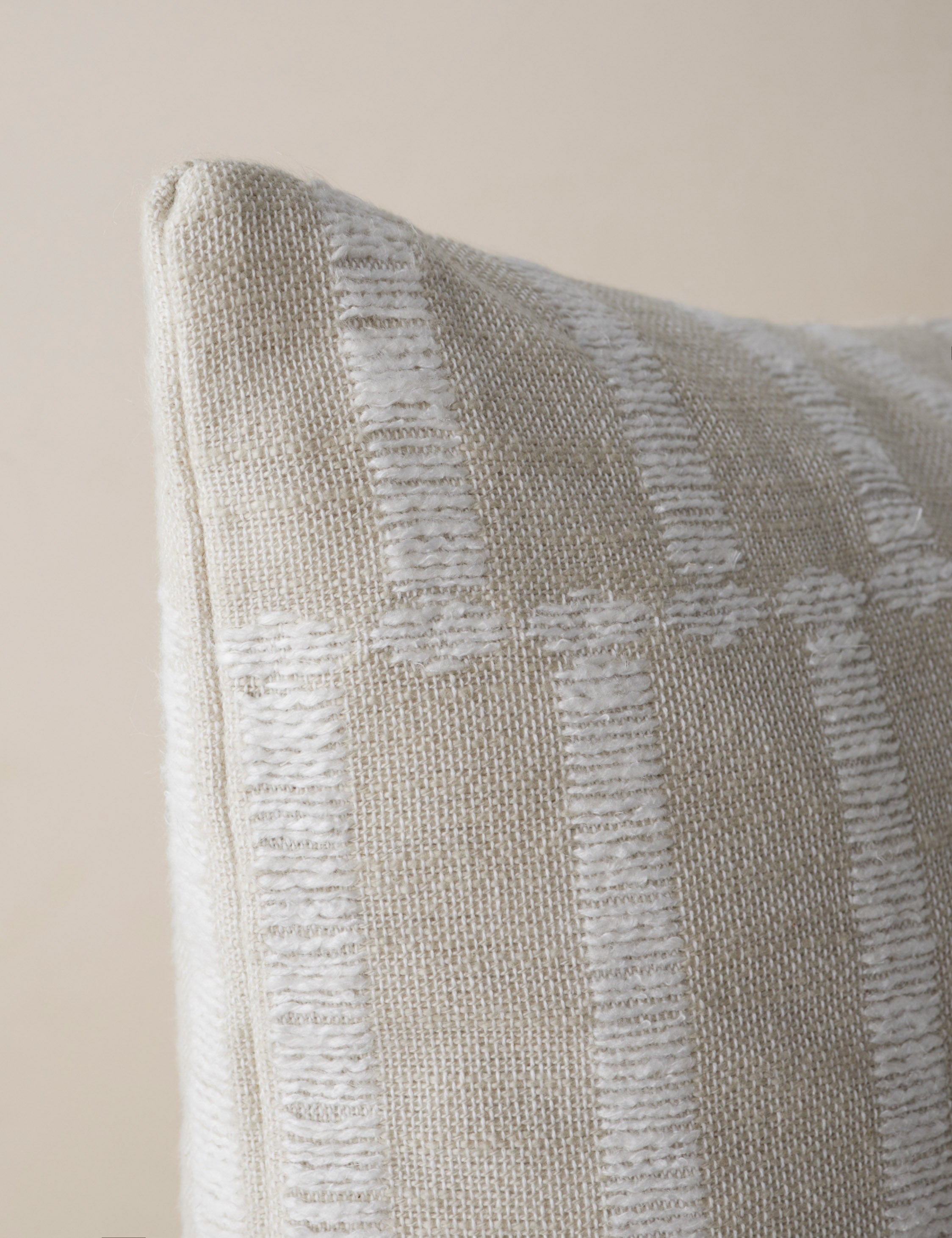 Corner of the Thisbe offset stripe pillow.