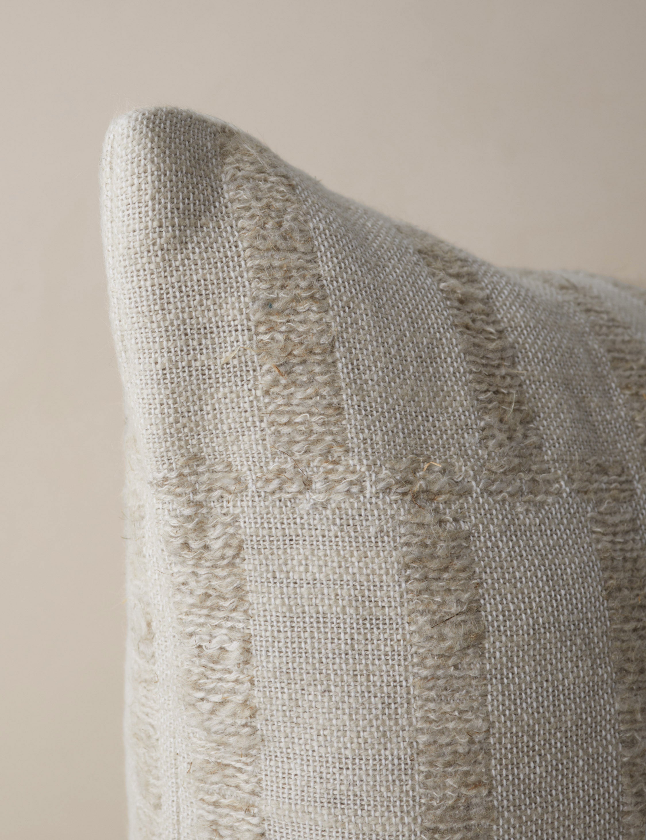 Corner of the Thisbe offset stripe pillow.