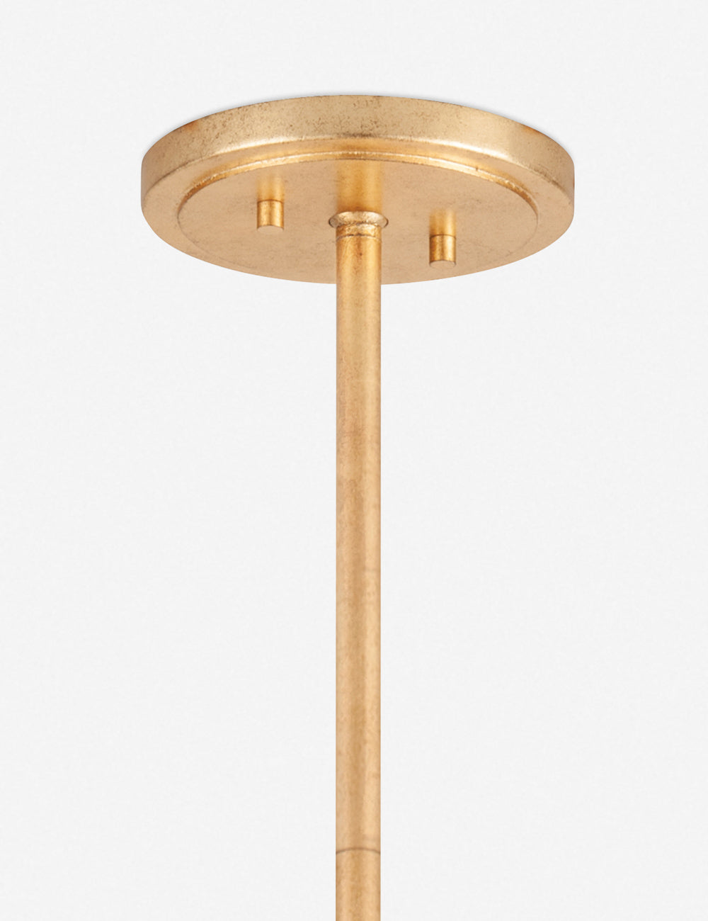 Close-up of the golden hanging mount on the Keller chandelier