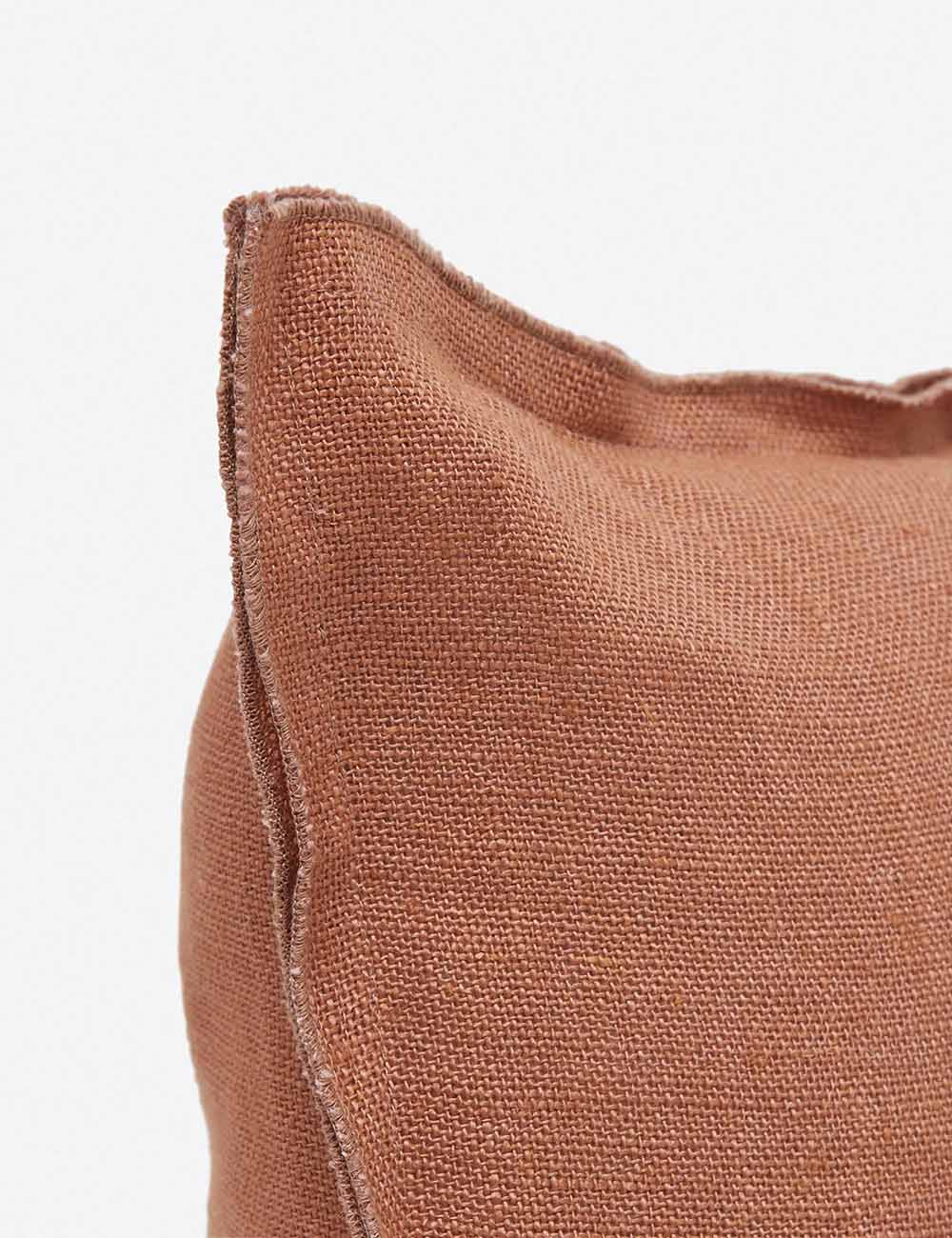 Corner of the arlo rust orange square pillow