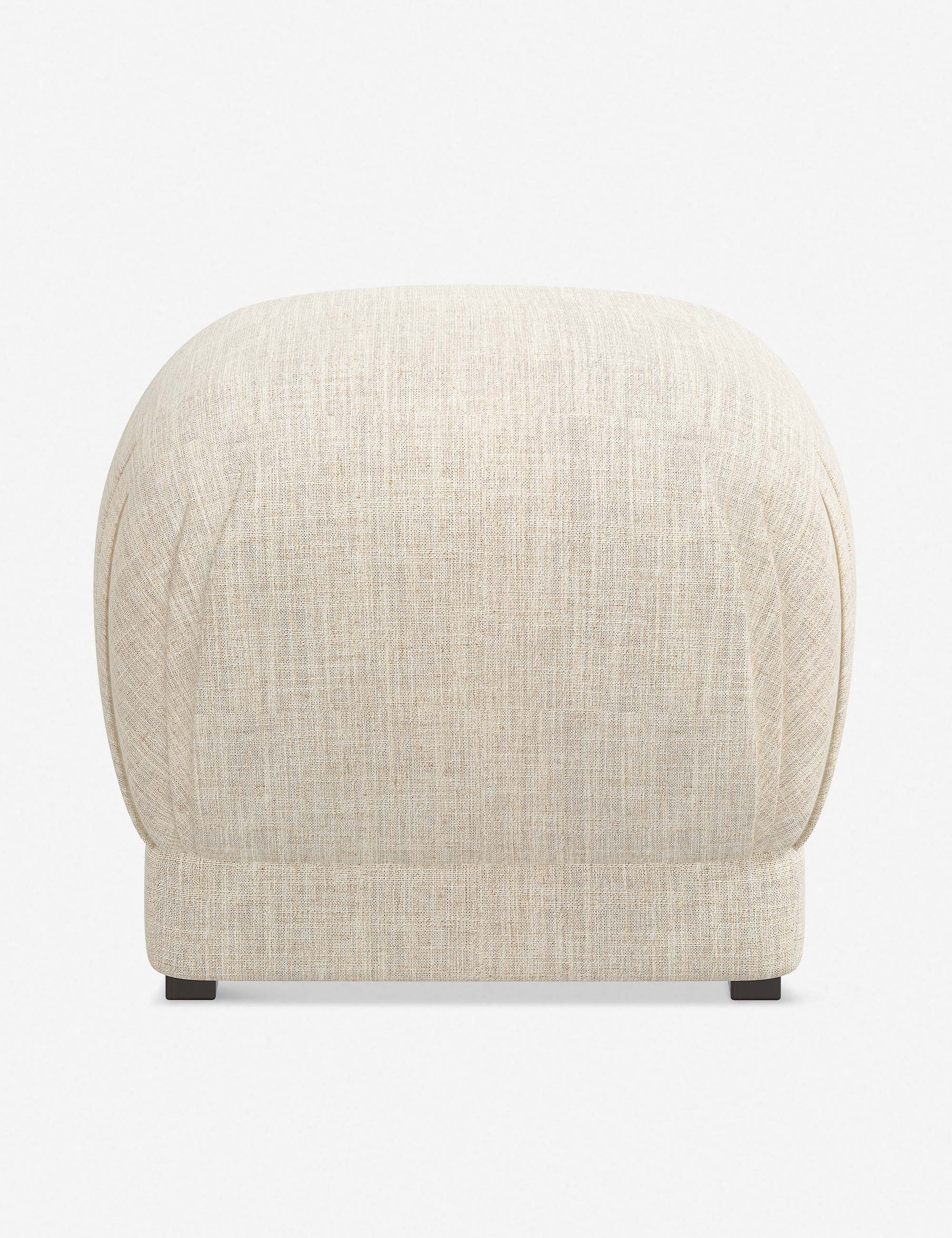 Bailee Talc Linen upholstered ottoman with a pouf-like design and pleated corners