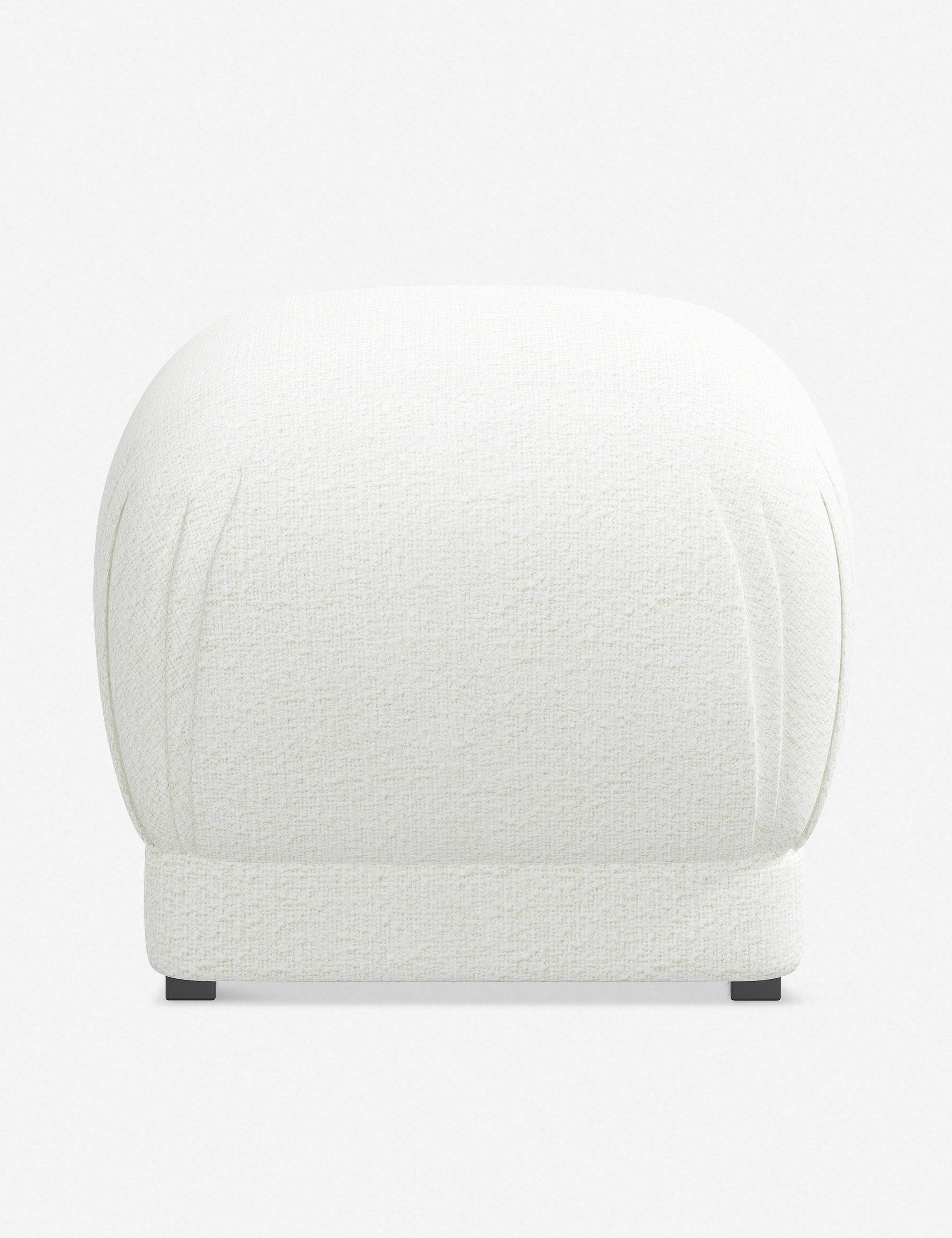 Bailee White Boucle upholstered ottoman with a pouf-like design and pleated corners