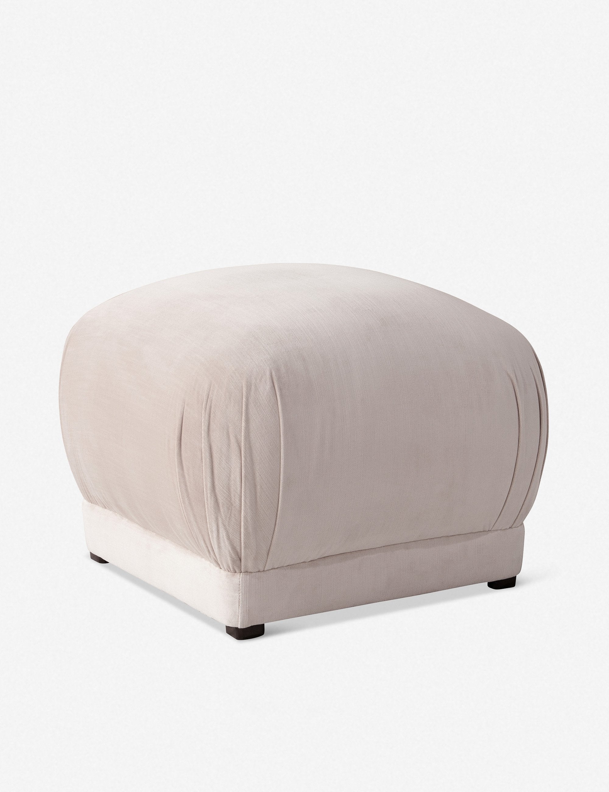 Bailee Mineral Velvet upholstered ottoman with a pouf-like design and pleated corners